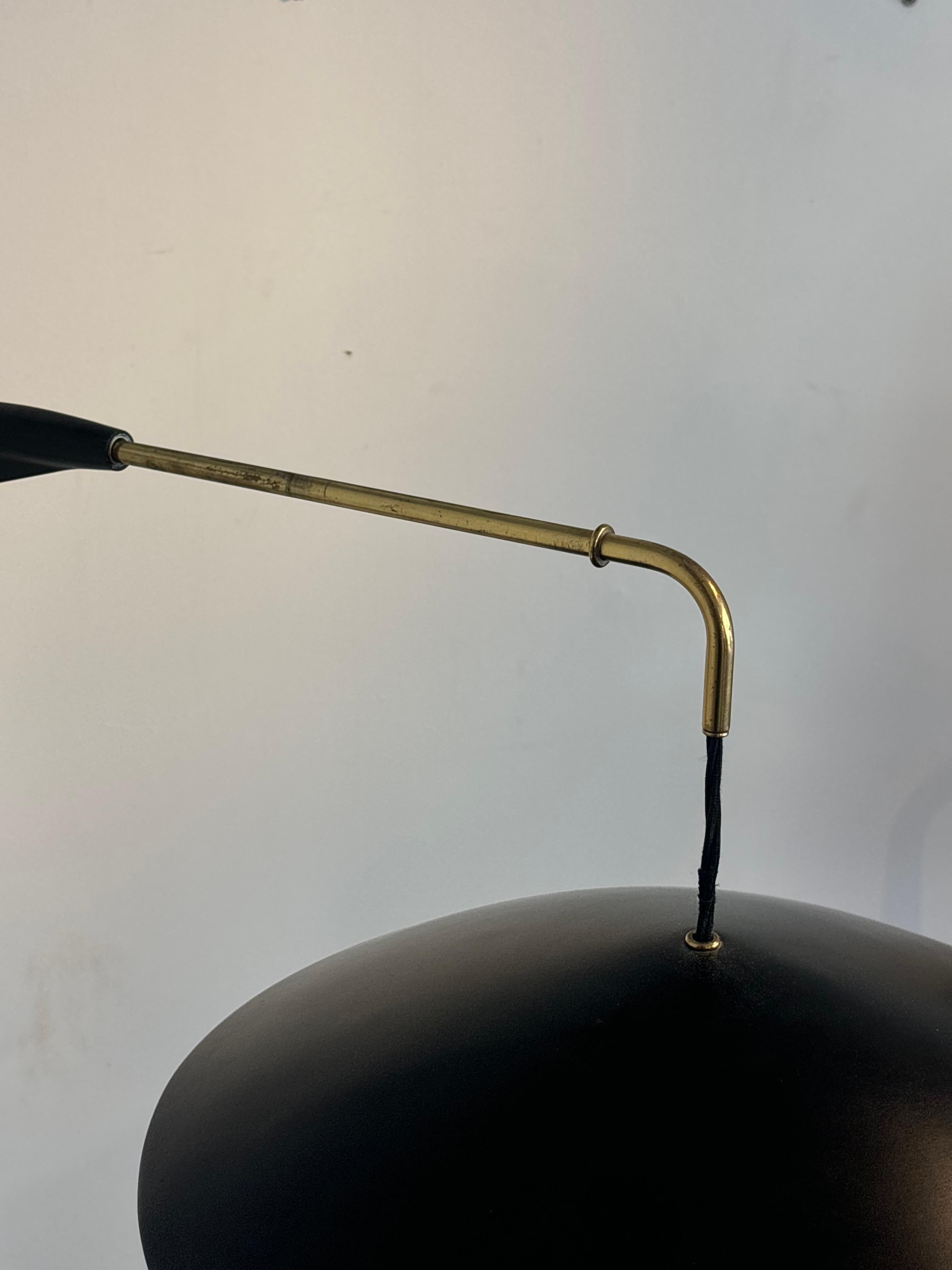 Counterbalancing wall light by Arlus, circa 1960