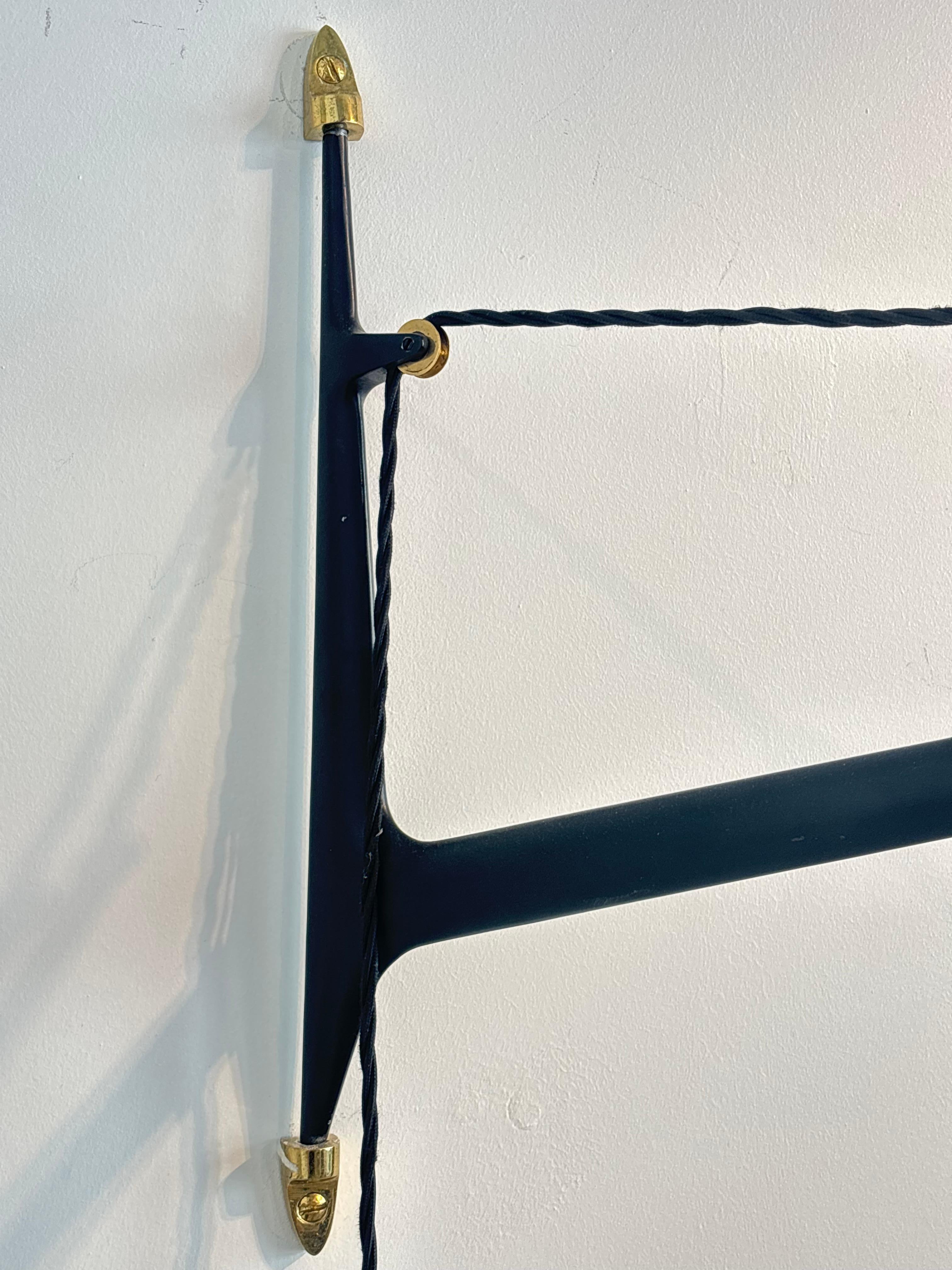 Counterbalancing wall light by Arlus, circa 1960