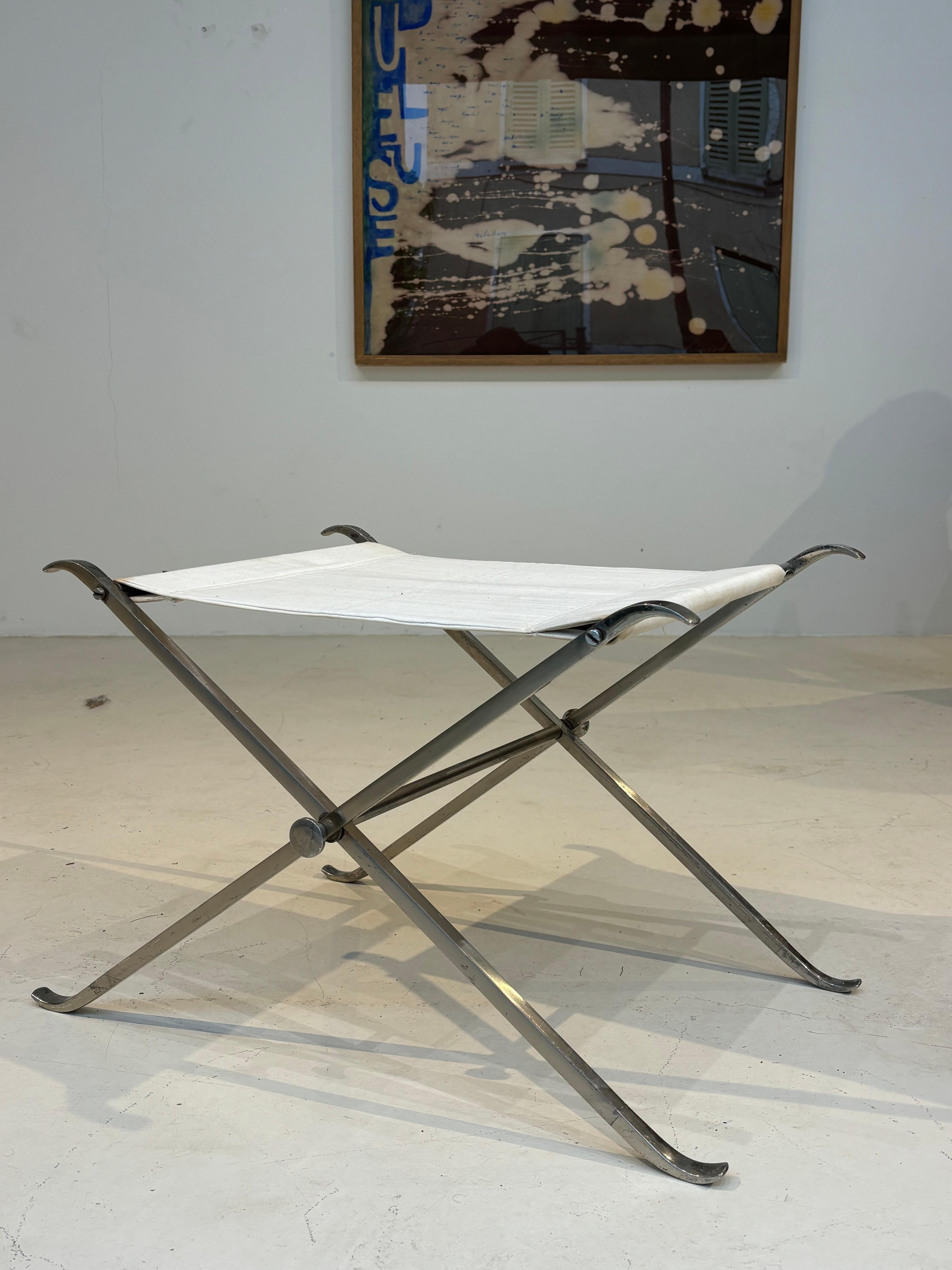 Stool by la maison Charles in stainless steel