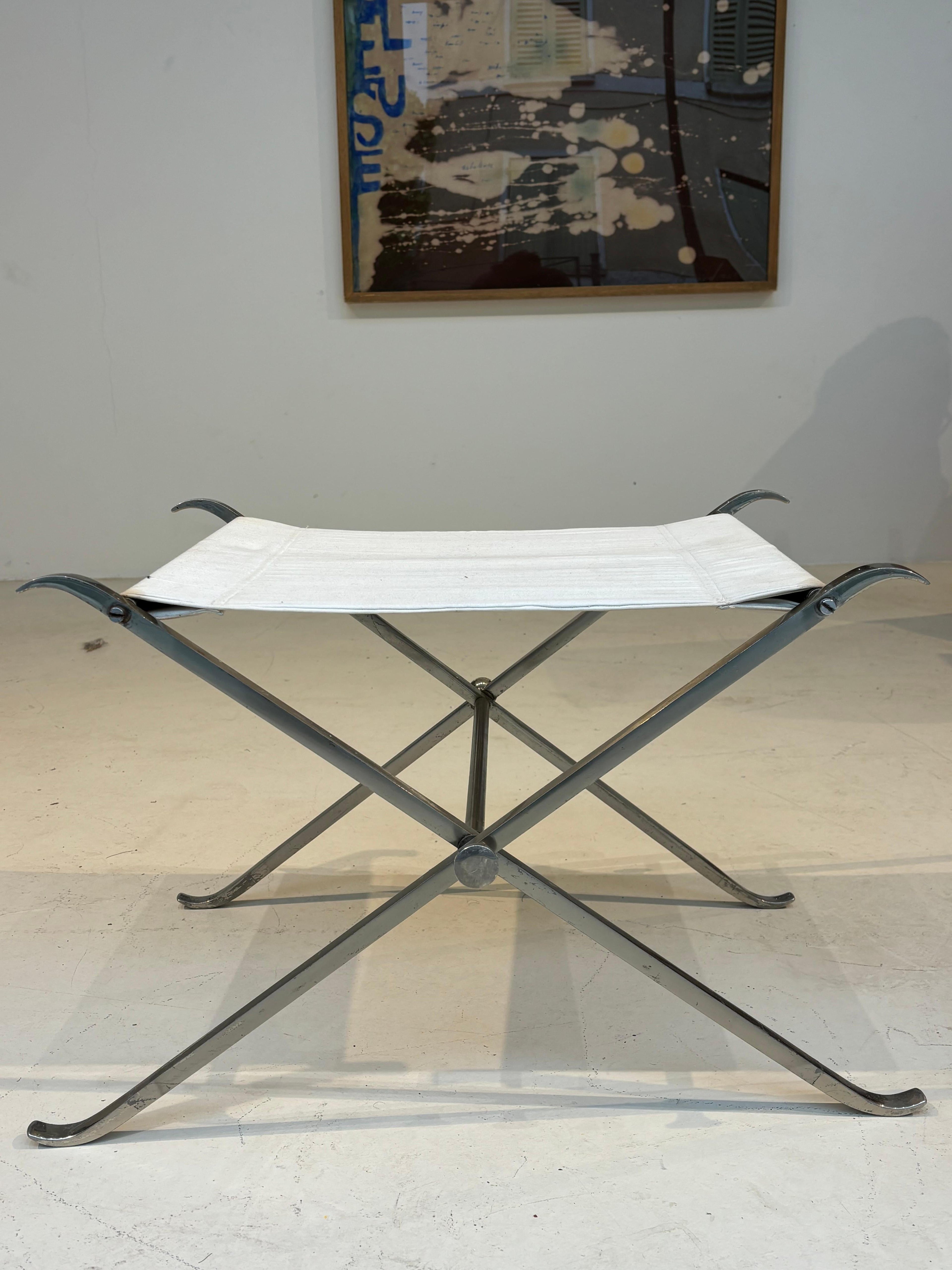 Stool by la maison Charles in stainless steel