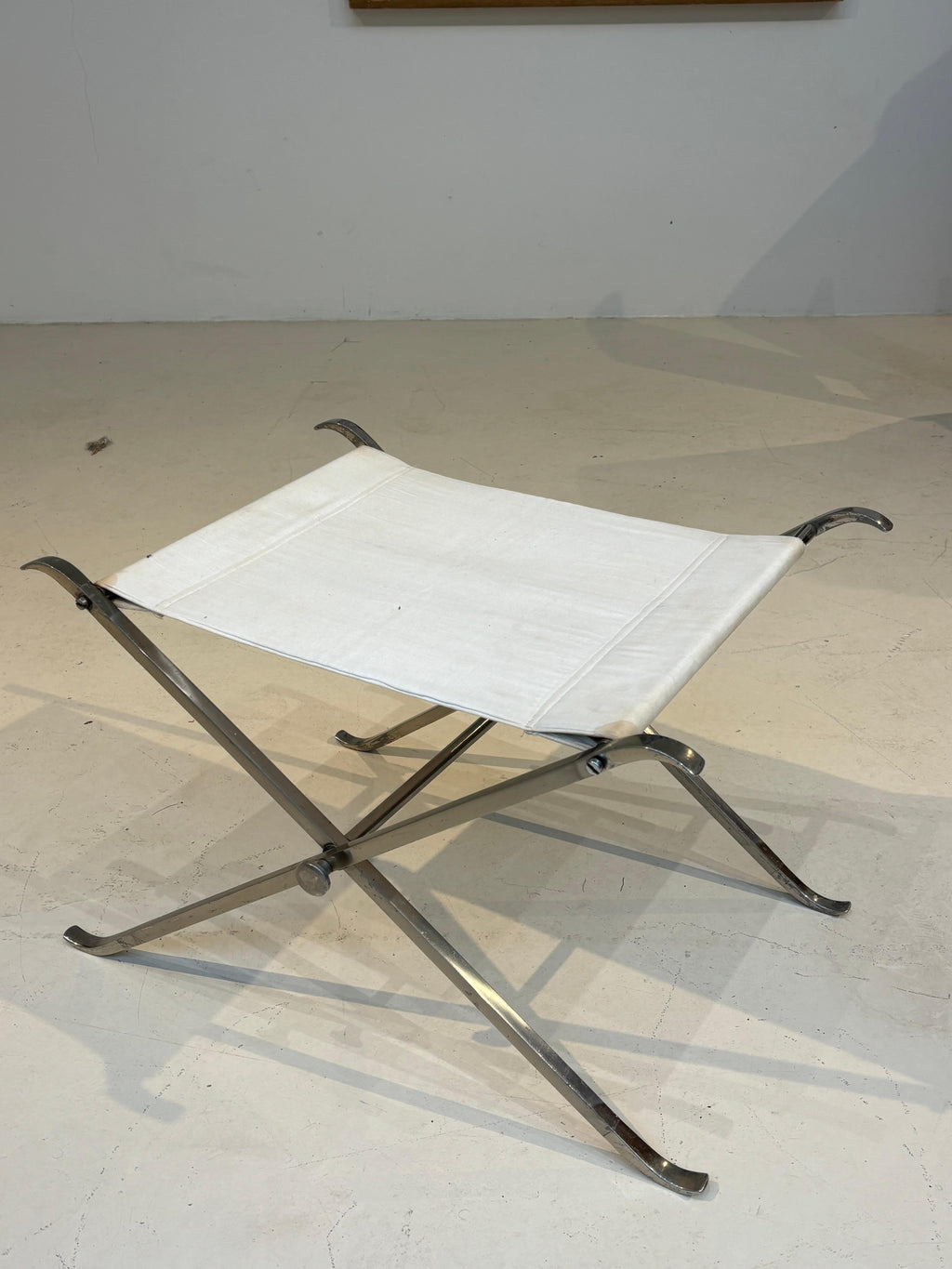 Stool by la maison Charles in stainless steel