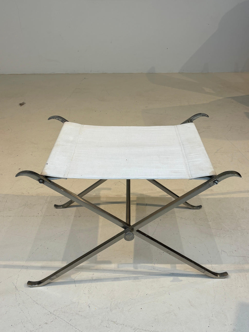 Stool by la maison Charles in stainless steel