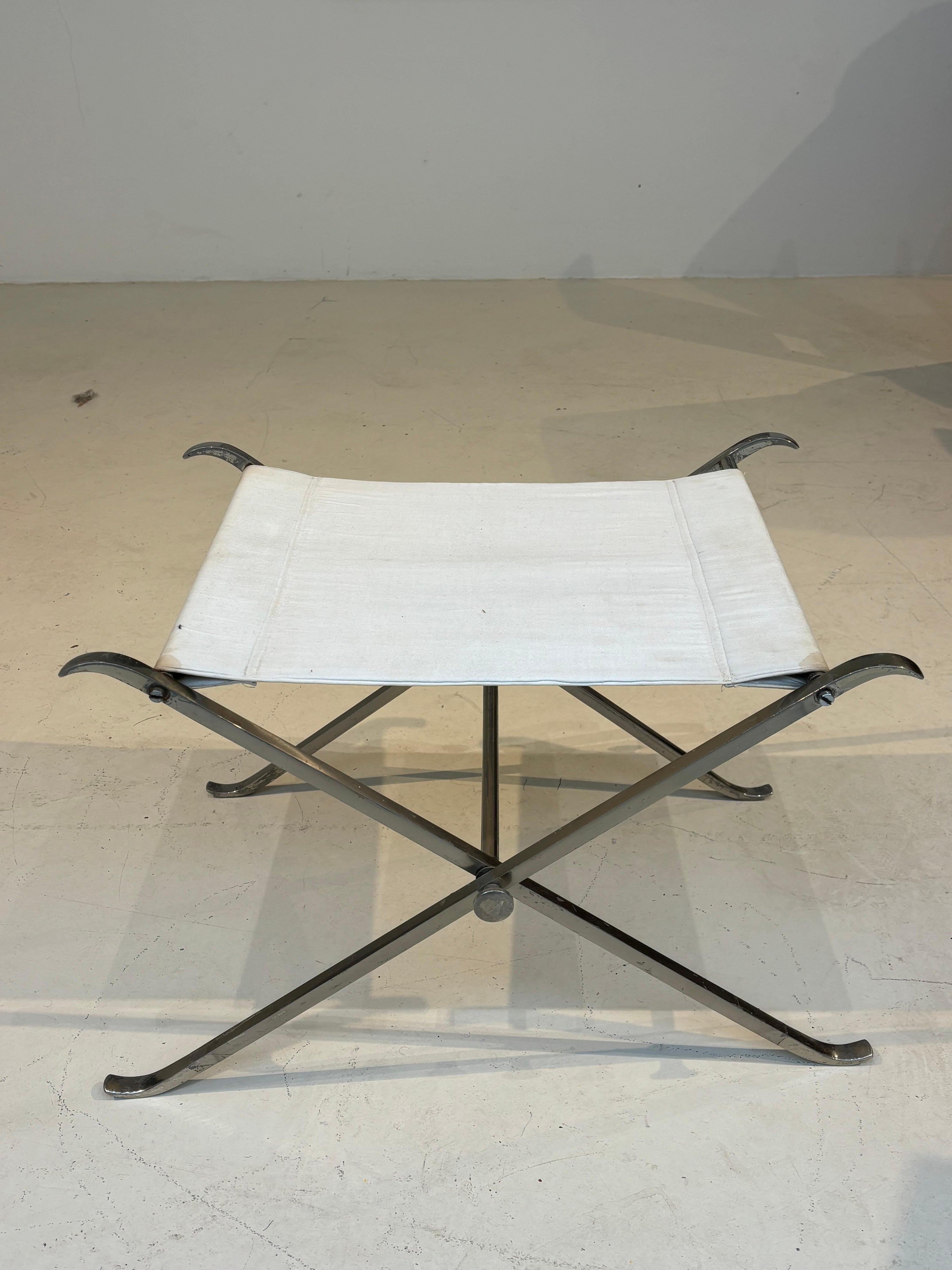 Stool by la maison Charles in stainless steel