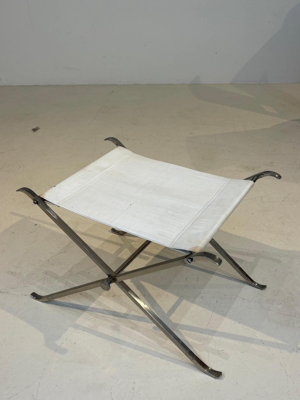 Stool by la maison Charles in stainless steel