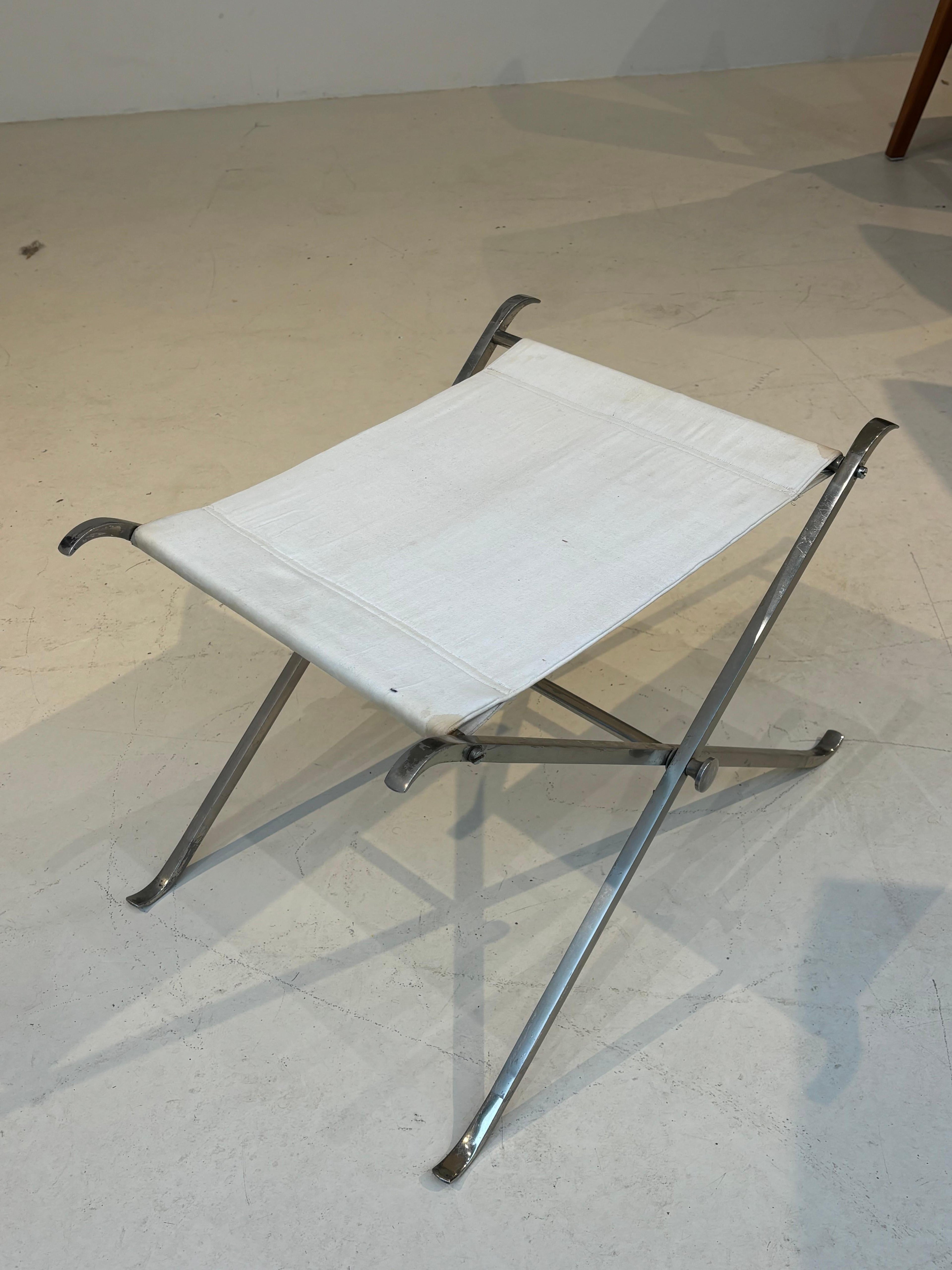 Stool by la maison Charles in stainless steel
