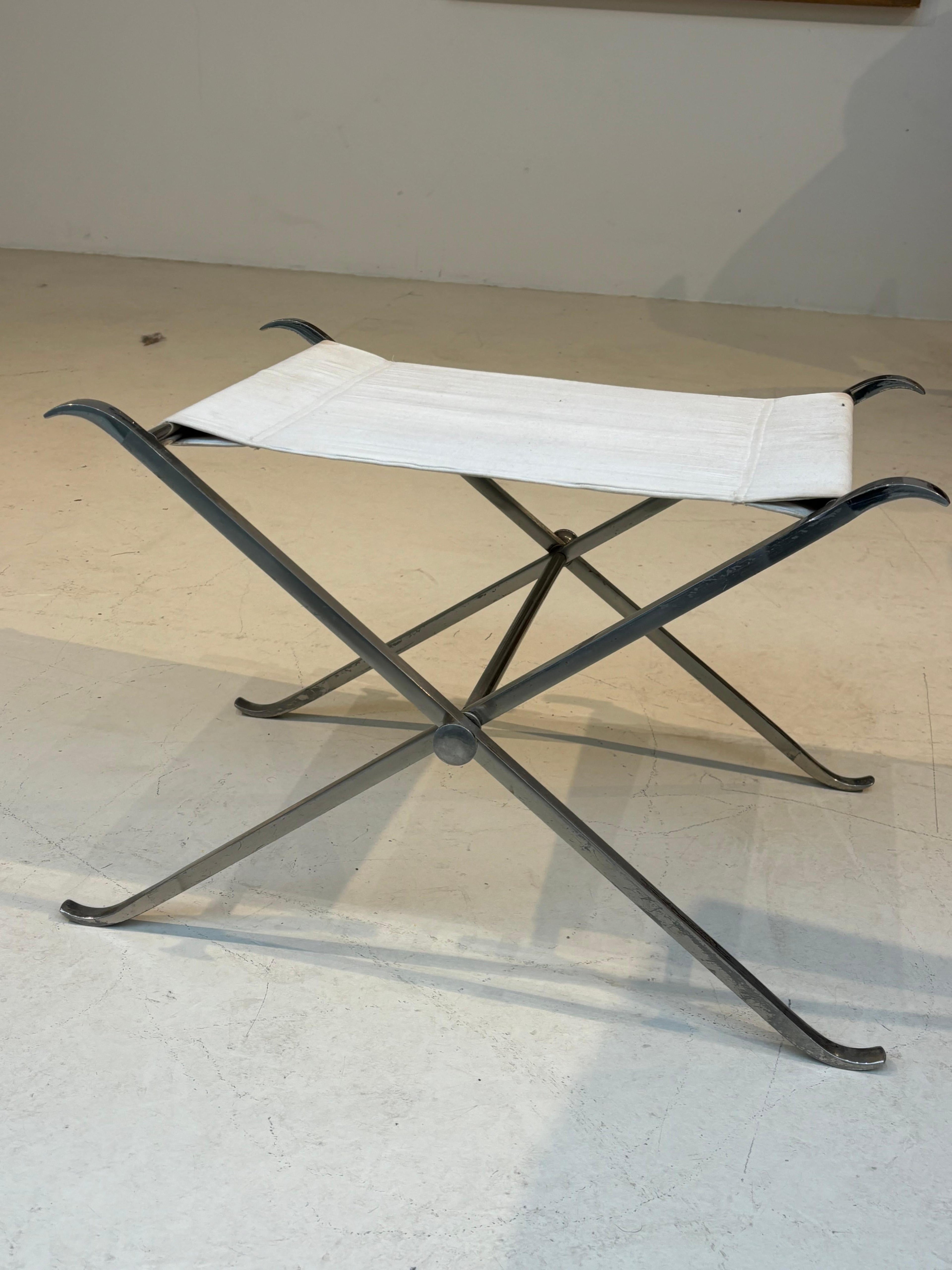 Stool by la maison Charles in stainless steel
