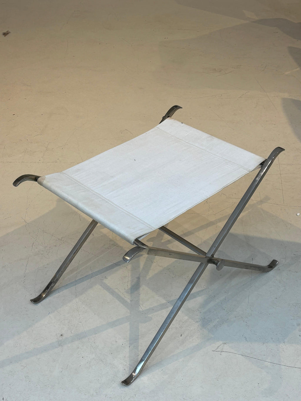 Stool by la maison Charles in stainless steel