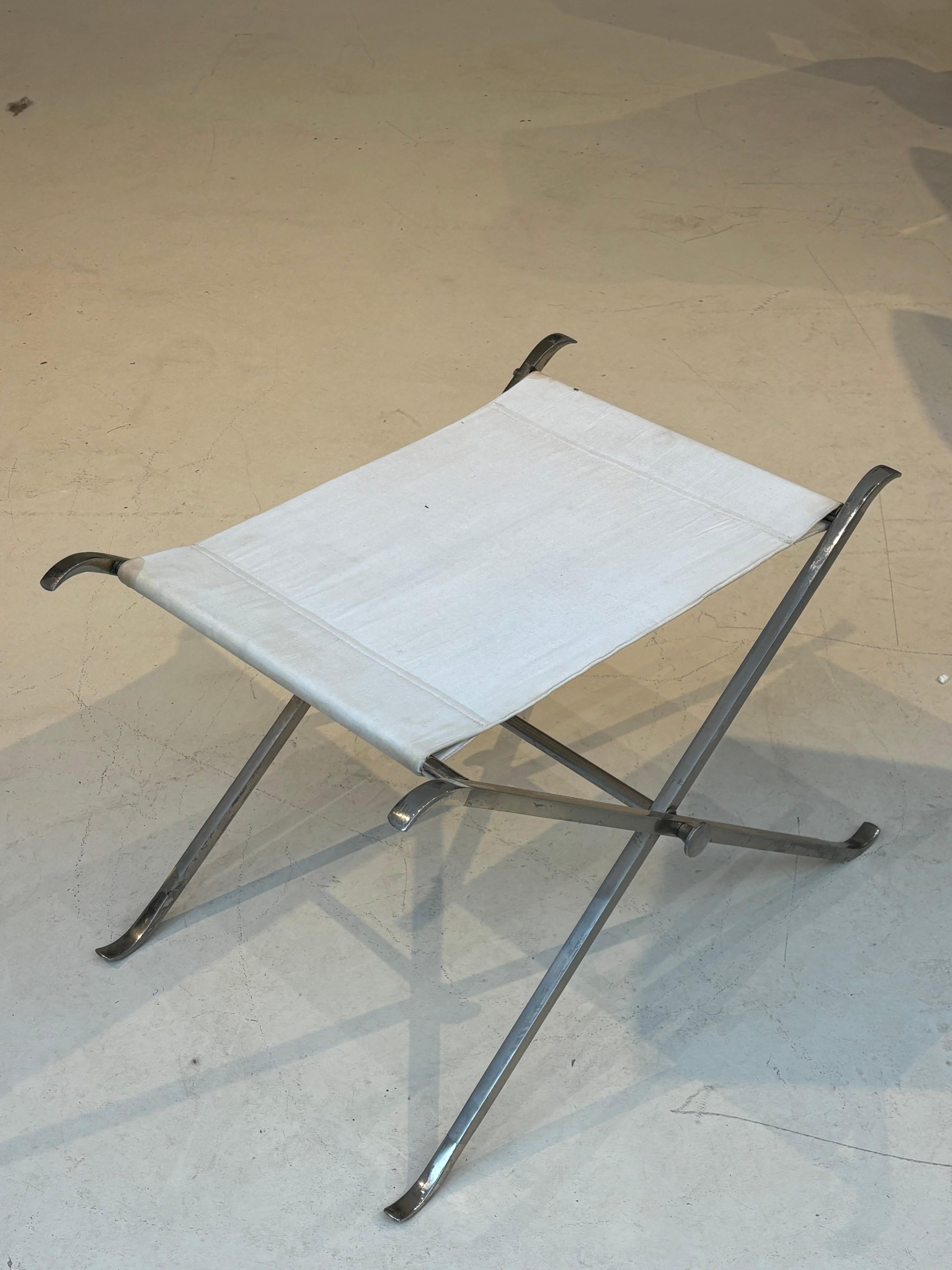 Stool by la maison Charles in stainless steel