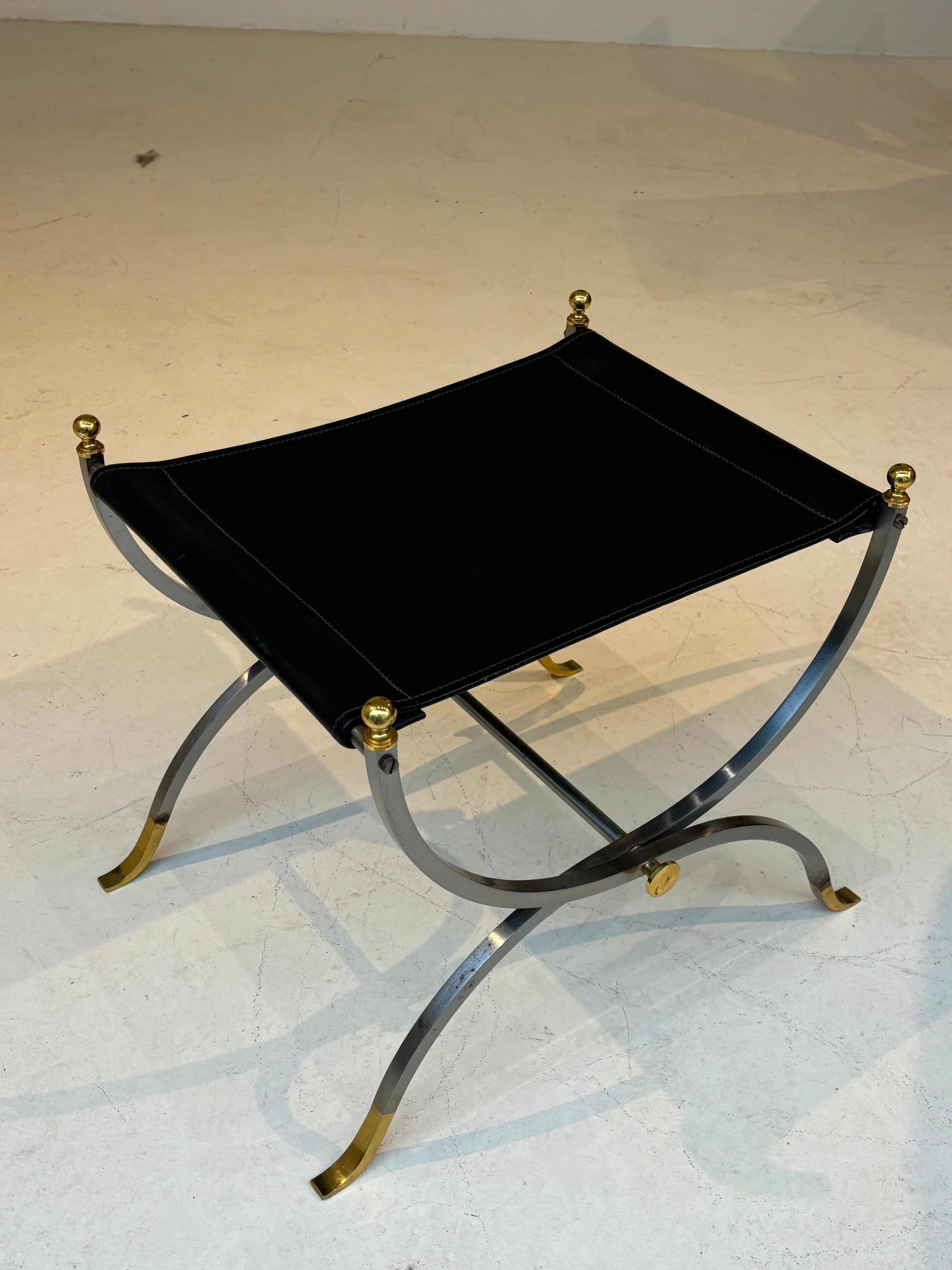 Stool by la maison Charles in stainless steel, brass and leather