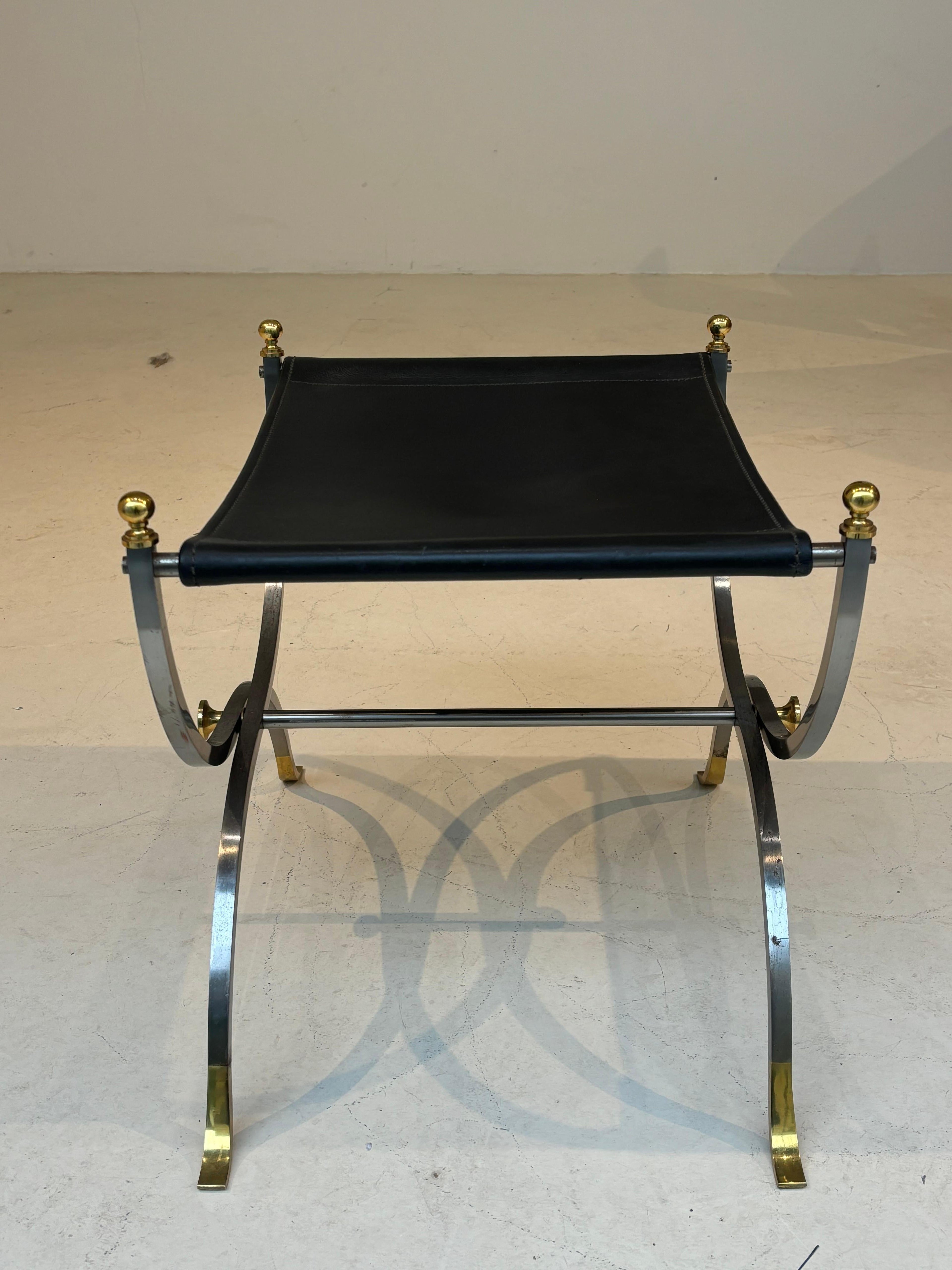 Stool by la maison Charles in stainless steel, brass and leather