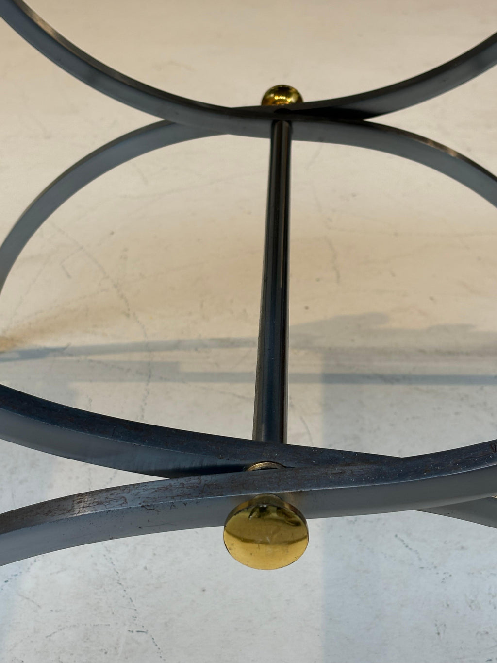 Stool by la maison Charles in stainless steel, brass and leather