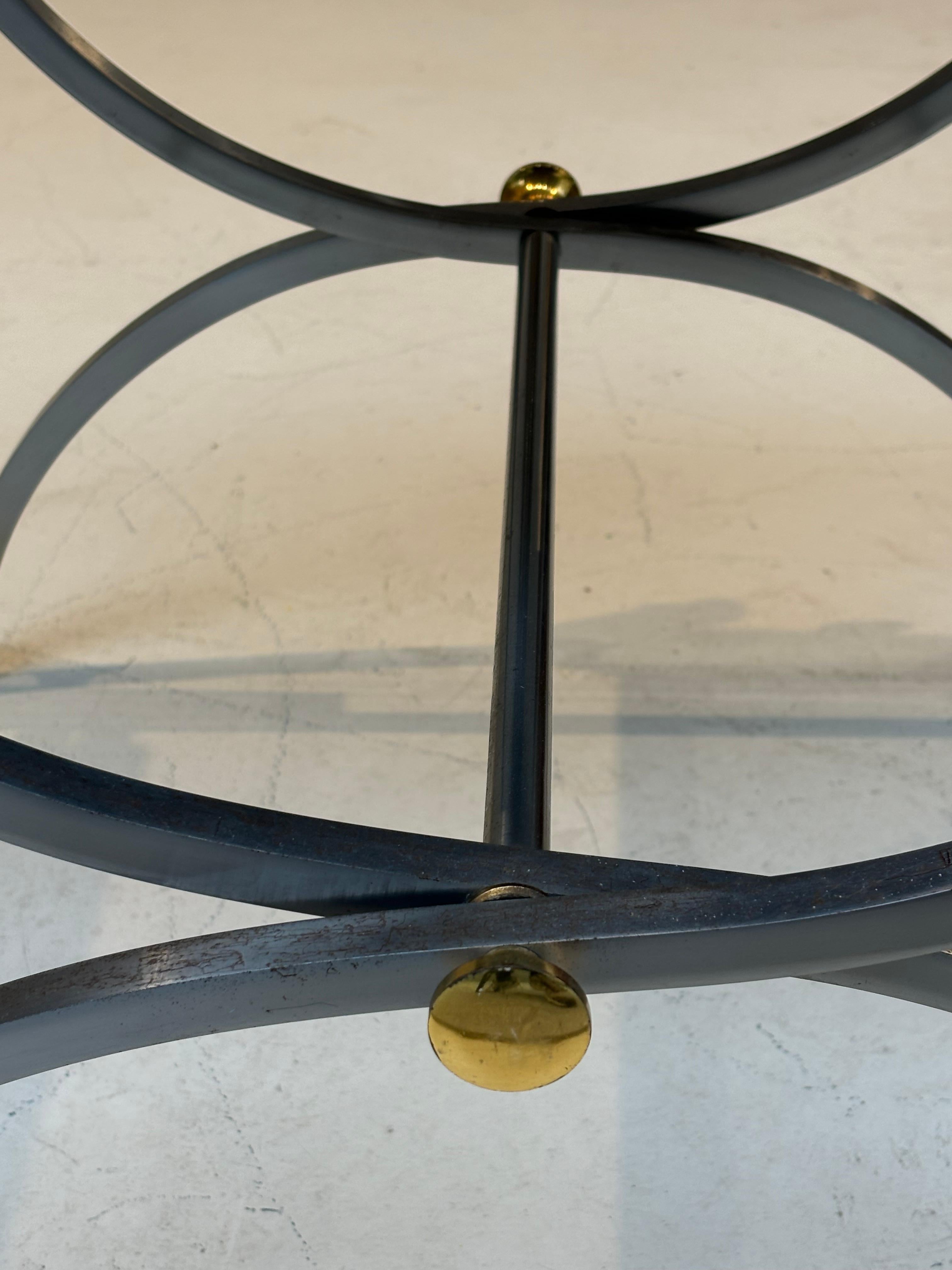 Stool by la maison Charles in stainless steel, brass and leather