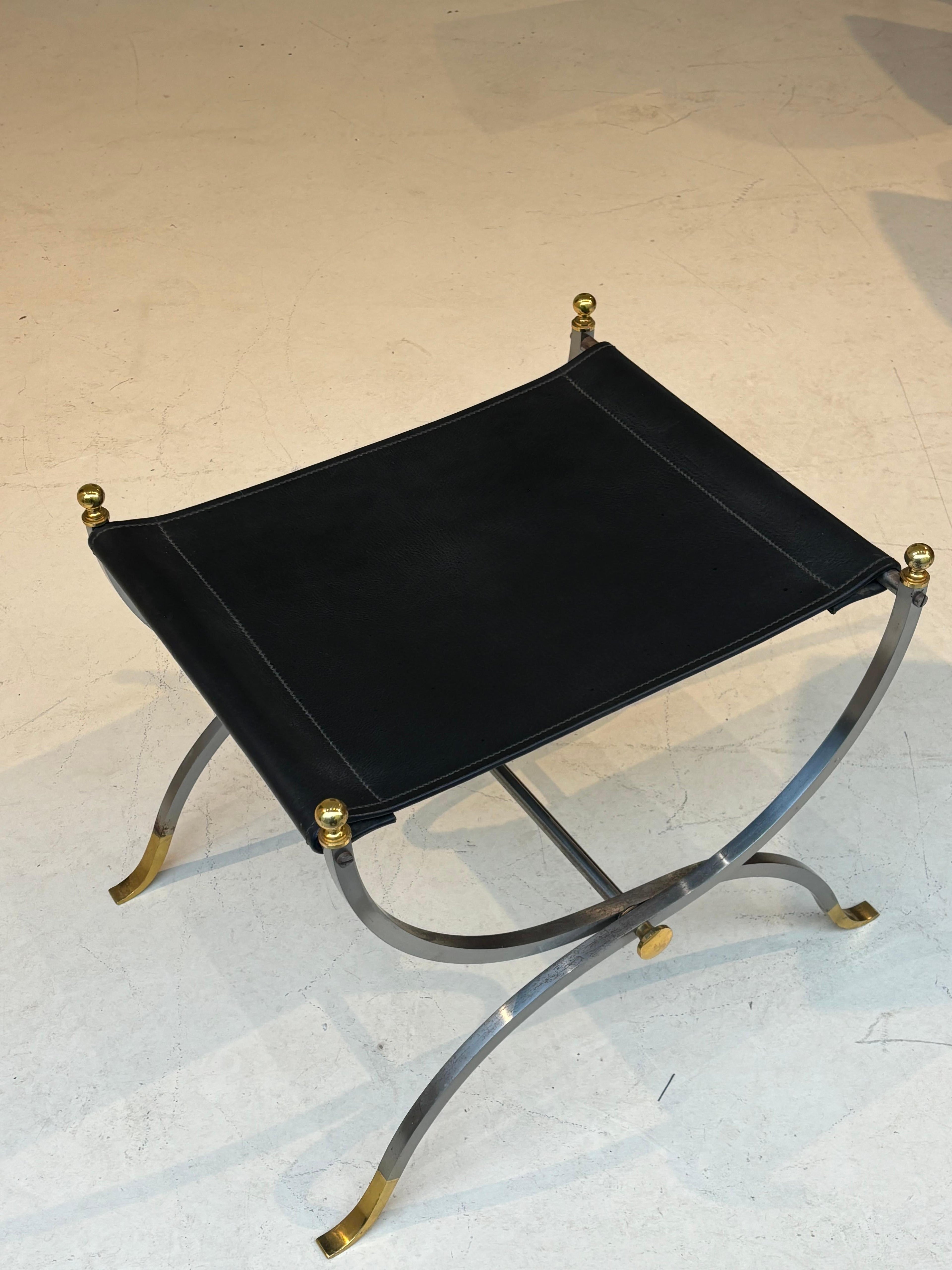 Stool by la maison Charles in stainless steel, brass and leather