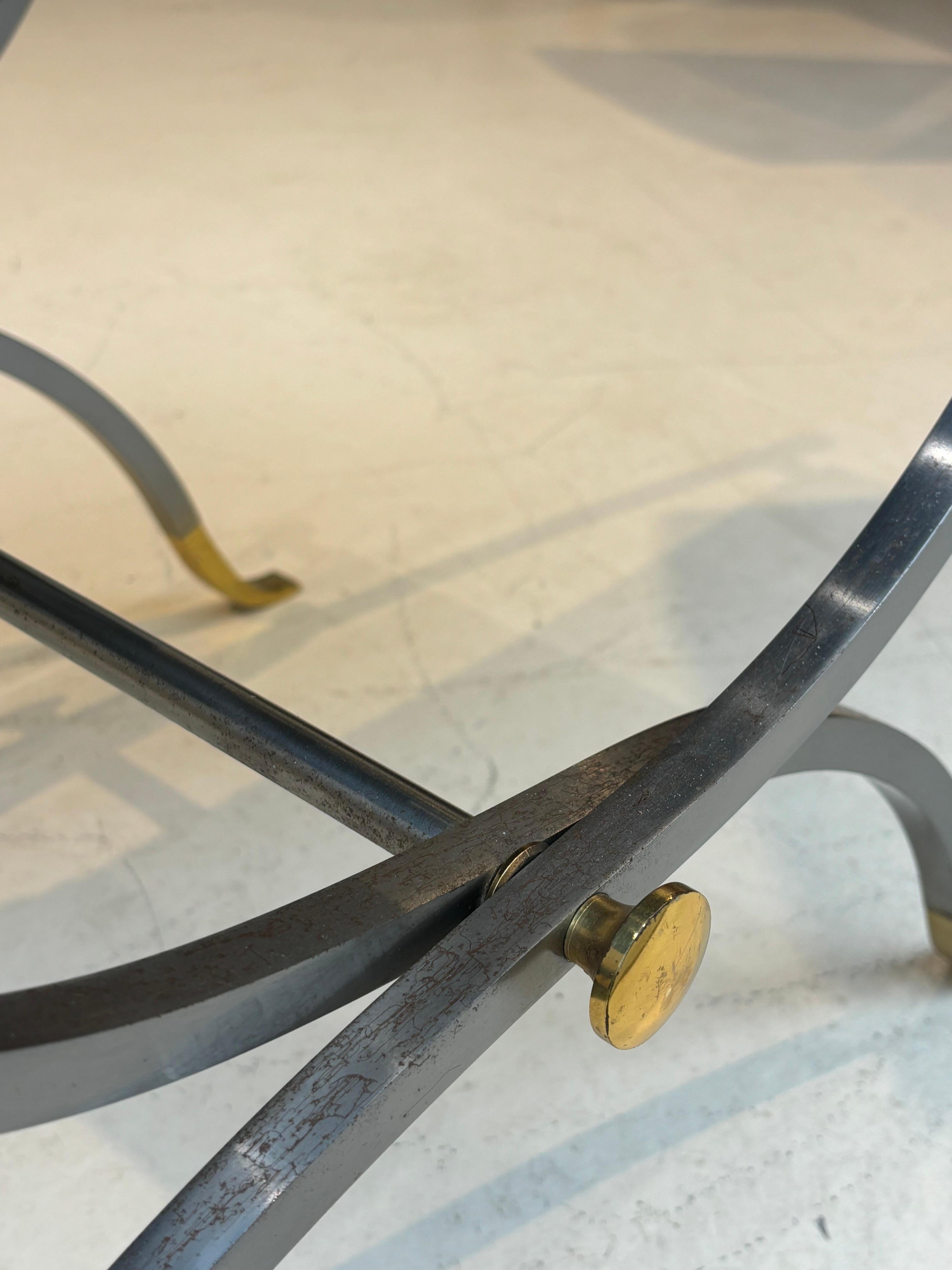 Stool by la maison Charles in stainless steel, brass and leather