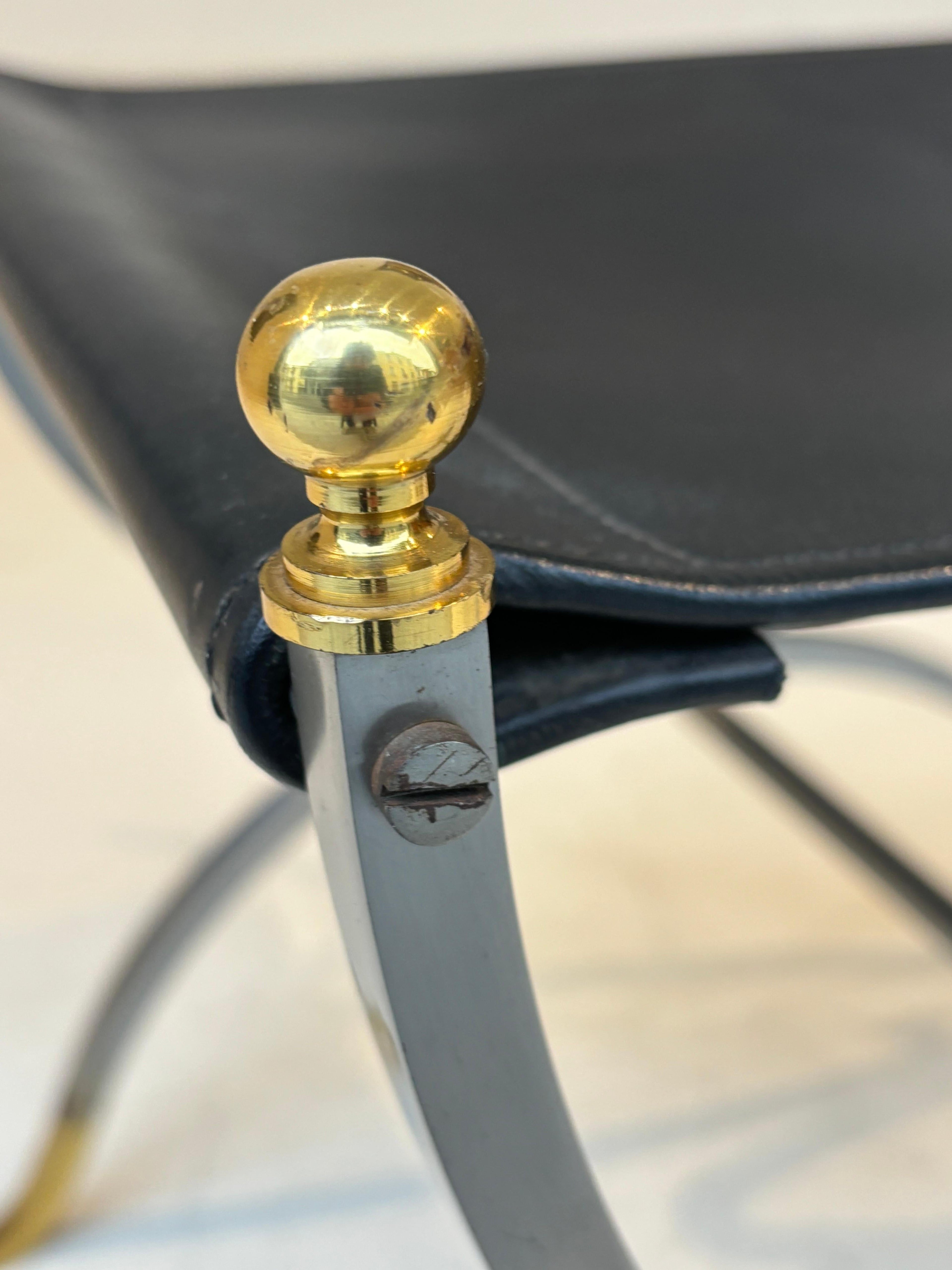 Stool by la maison Charles in stainless steel, brass and leather