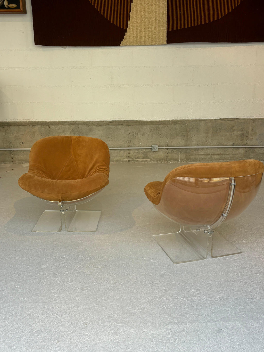 Scarce pair of easy chairs by Boris Tabacoff in lucite and suede