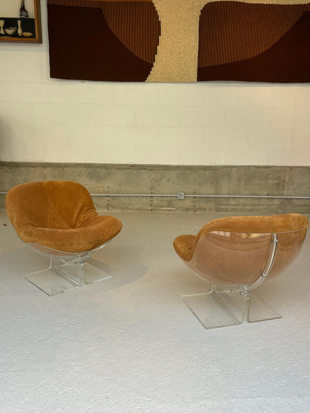 Scarce pair of easy chairs by Boris Tabacoff in lucite and suede