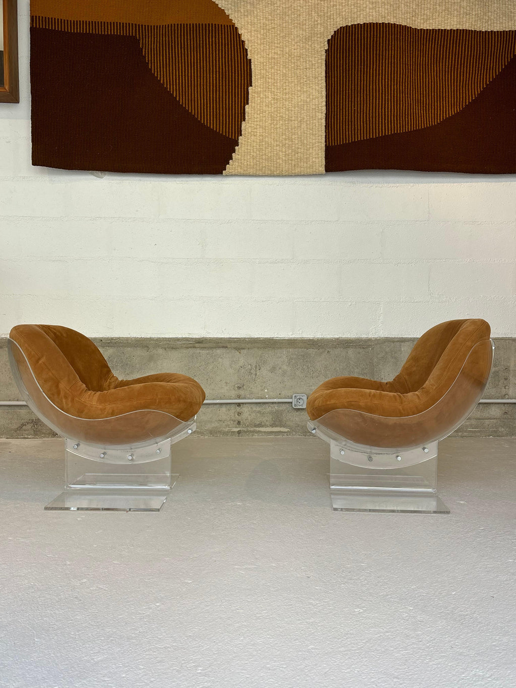 Scarce pair of easy chairs by Boris Tabacoff in lucite and suede