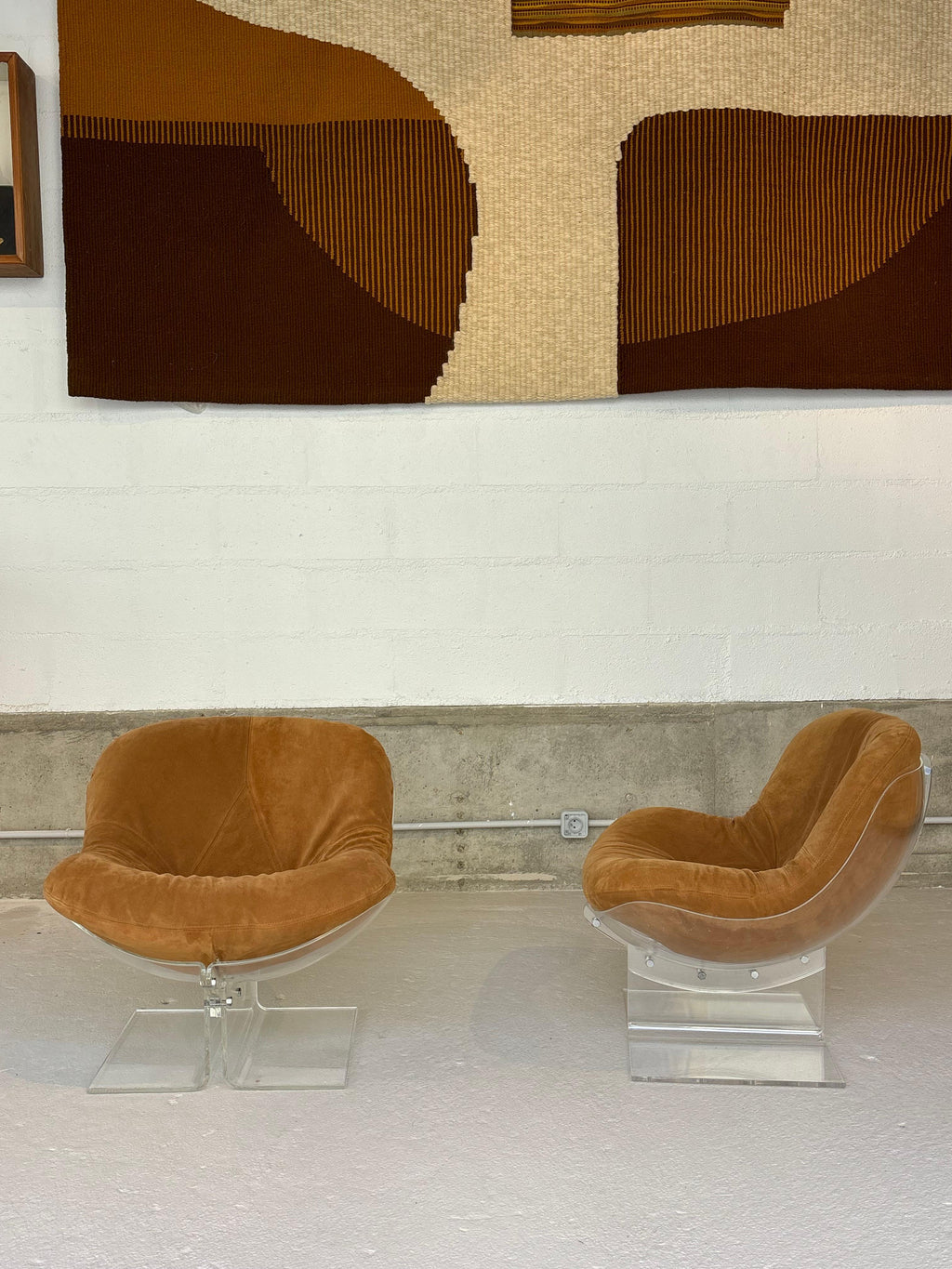 Scarce pair of easy chairs by Boris Tabacoff in lucite and suede