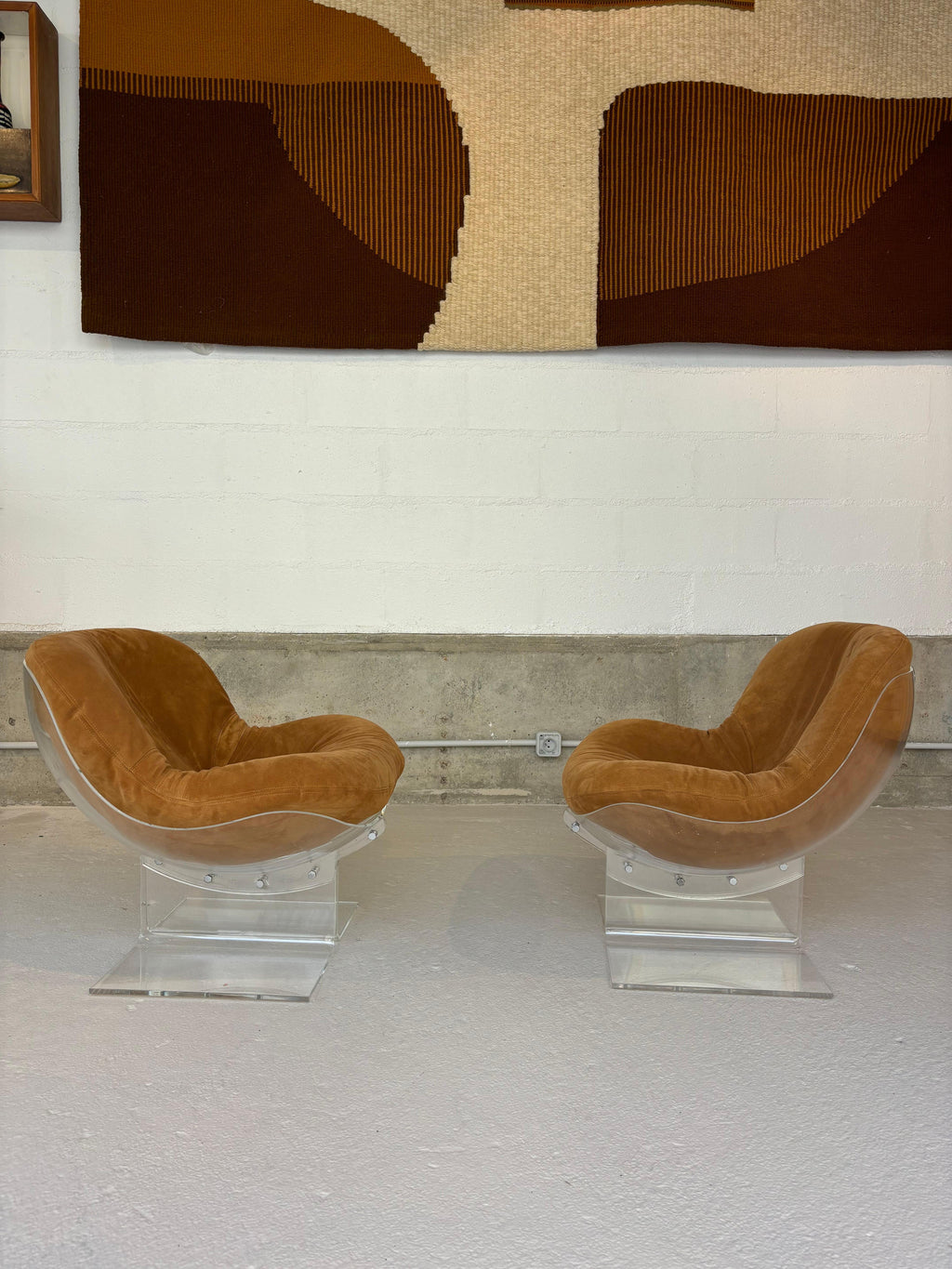 Scarce pair of easy chairs by Boris Tabacoff in lucite and suede