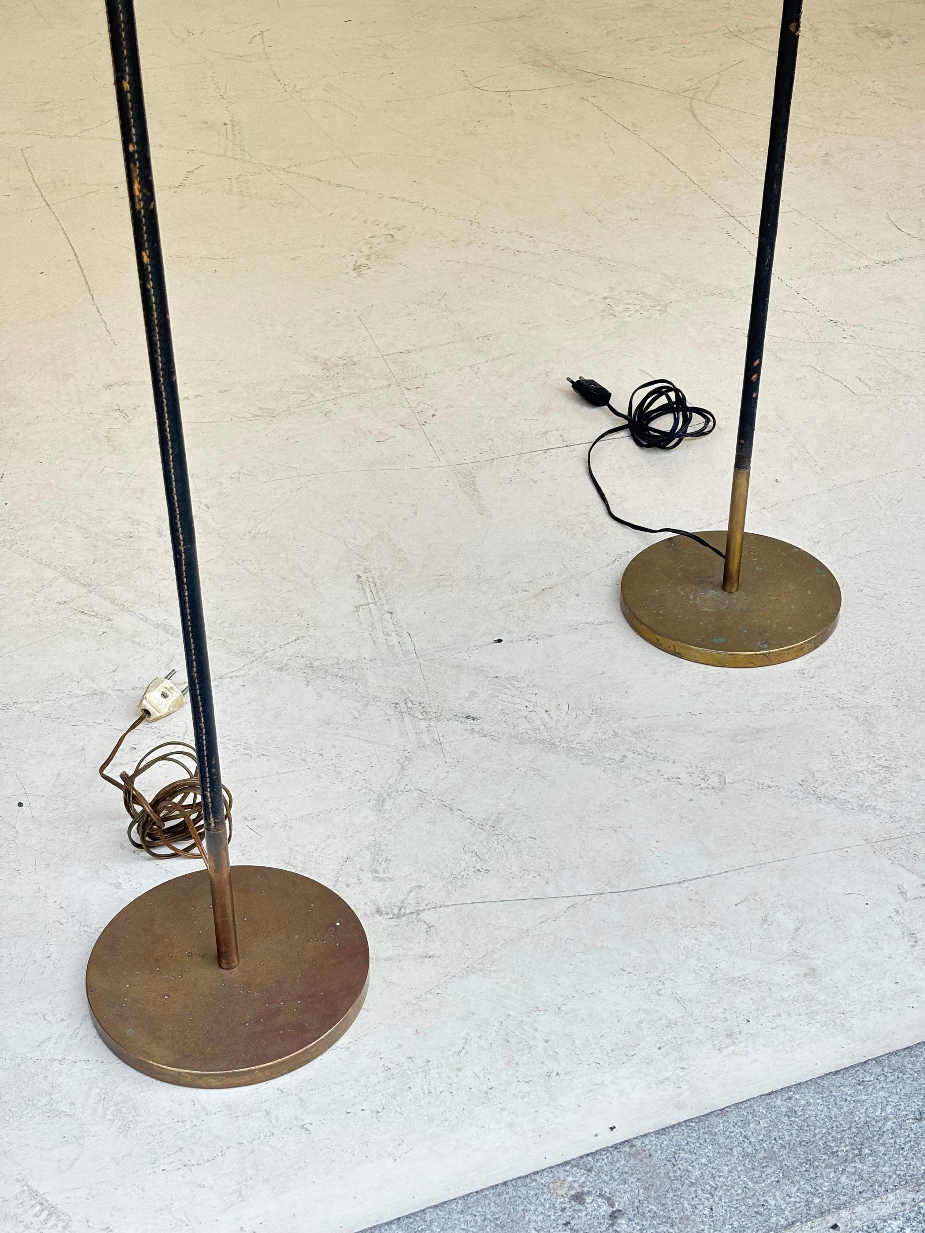 Beautiful pair of floorlamps by Jordi Vilanova in brass and stiched leather