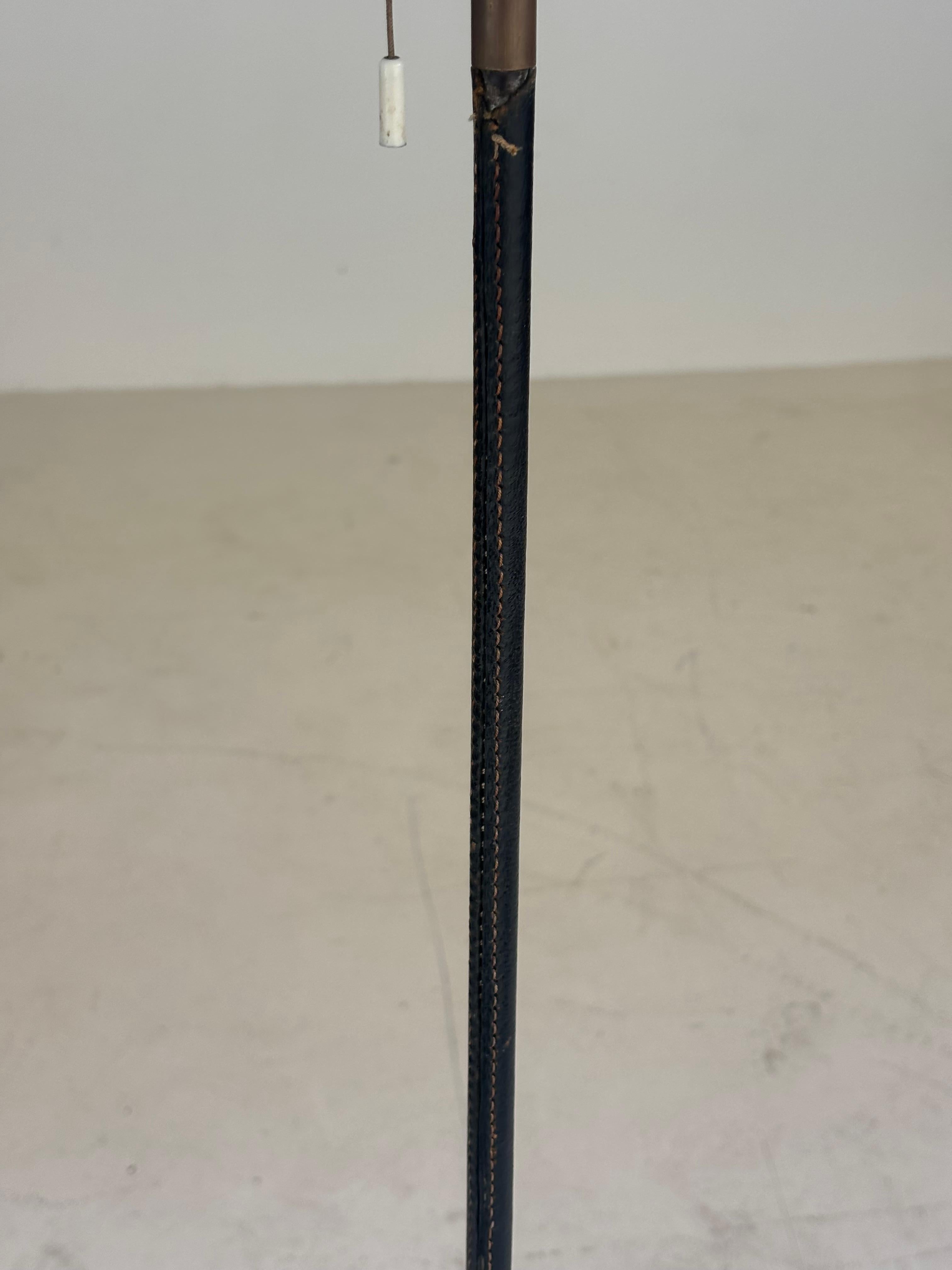 Beautiful pair of floorlamps by Jordi Vilanova in brass and stiched leather