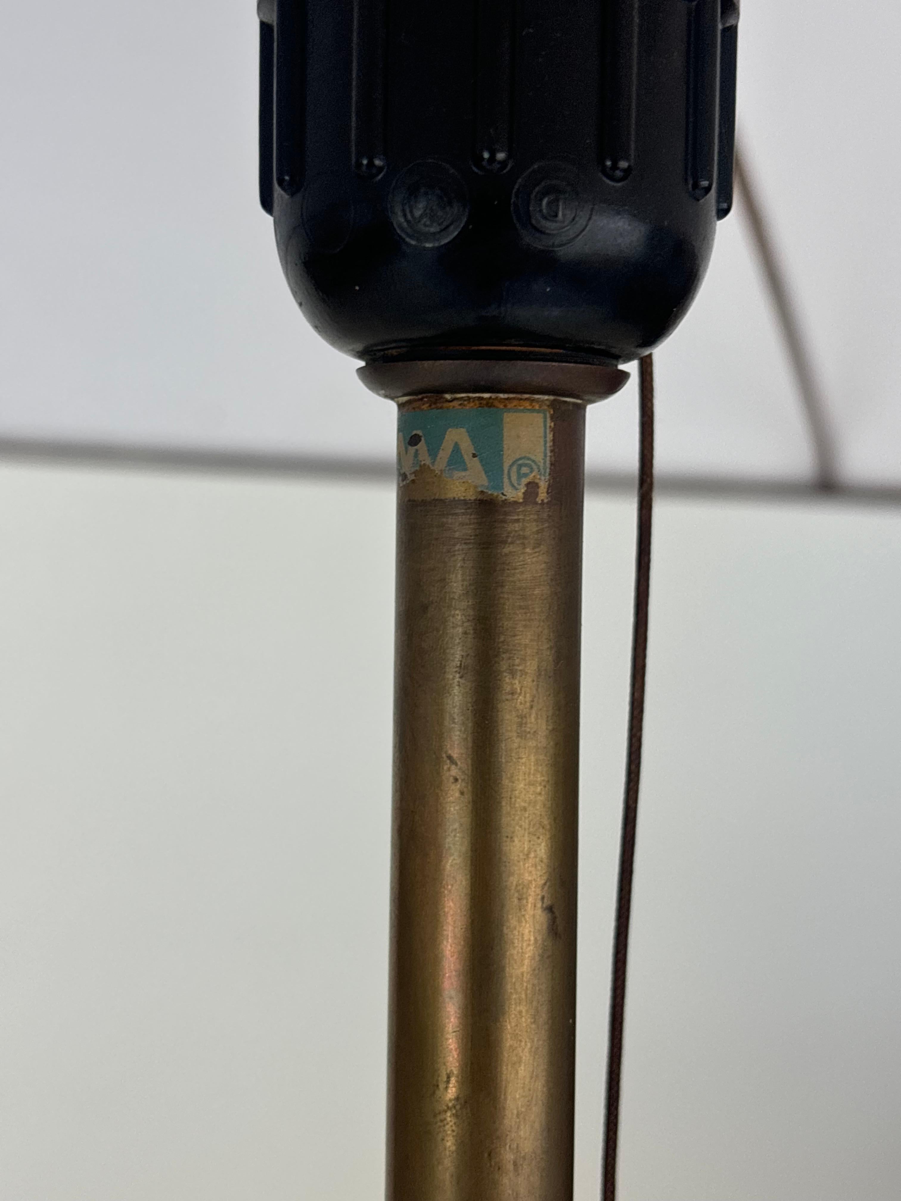 Beautiful pair of floorlamps by Jordi Vilanova in brass and stiched leather