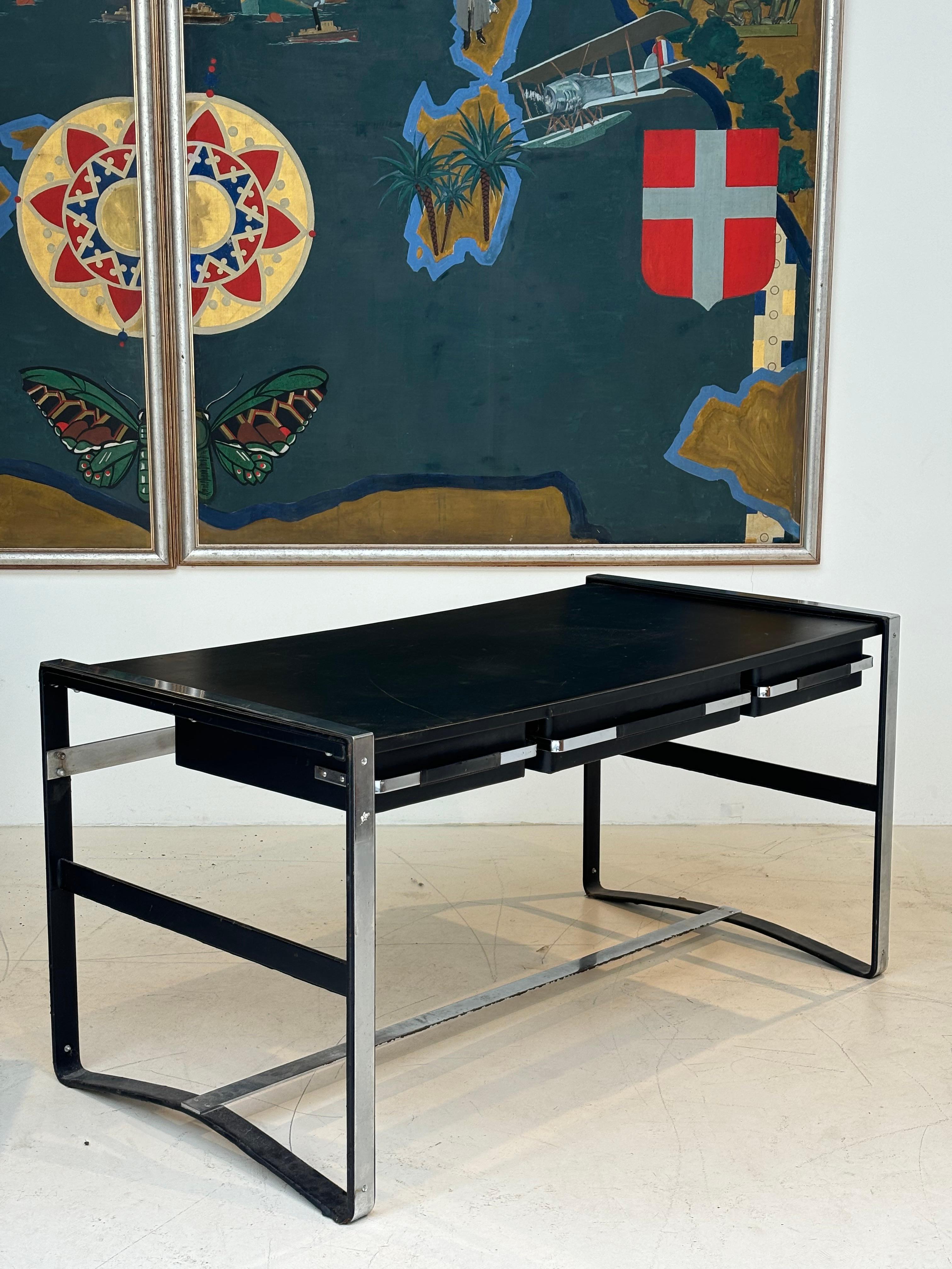 Nice desk in skai and steel by Jacques Adnet circa 1950