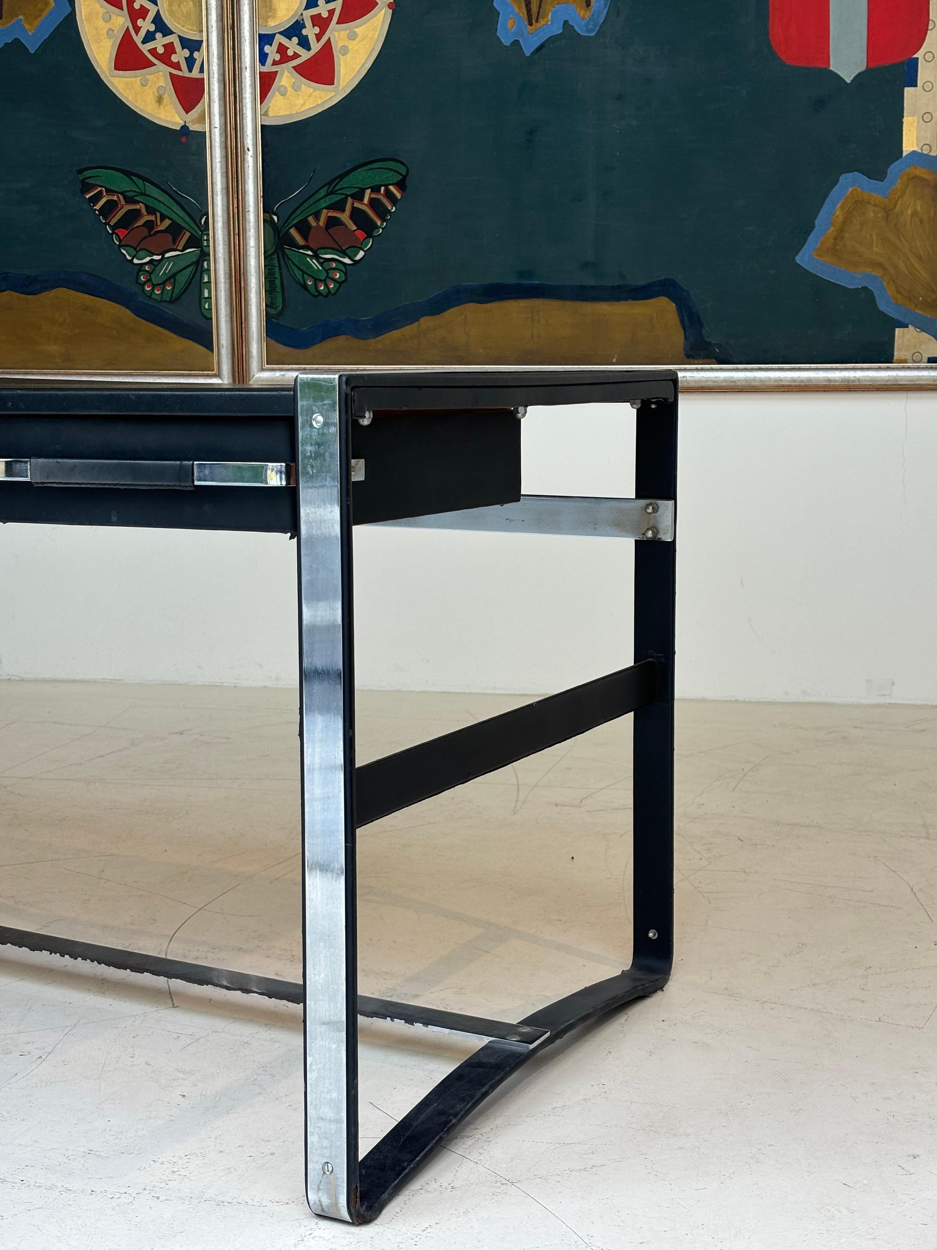 Nice desk in skai and steel by Jacques Adnet circa 1950