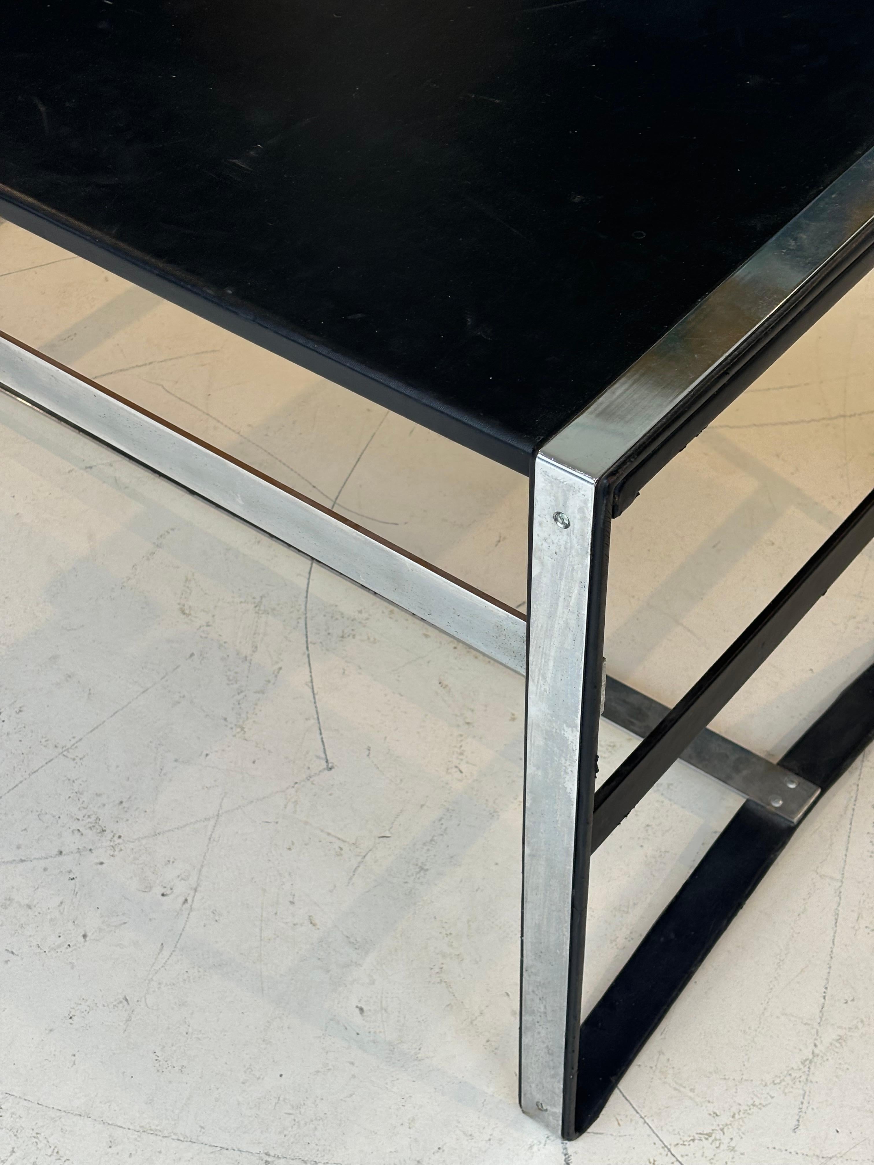Nice desk in skai and steel by Jacques Adnet circa 1950