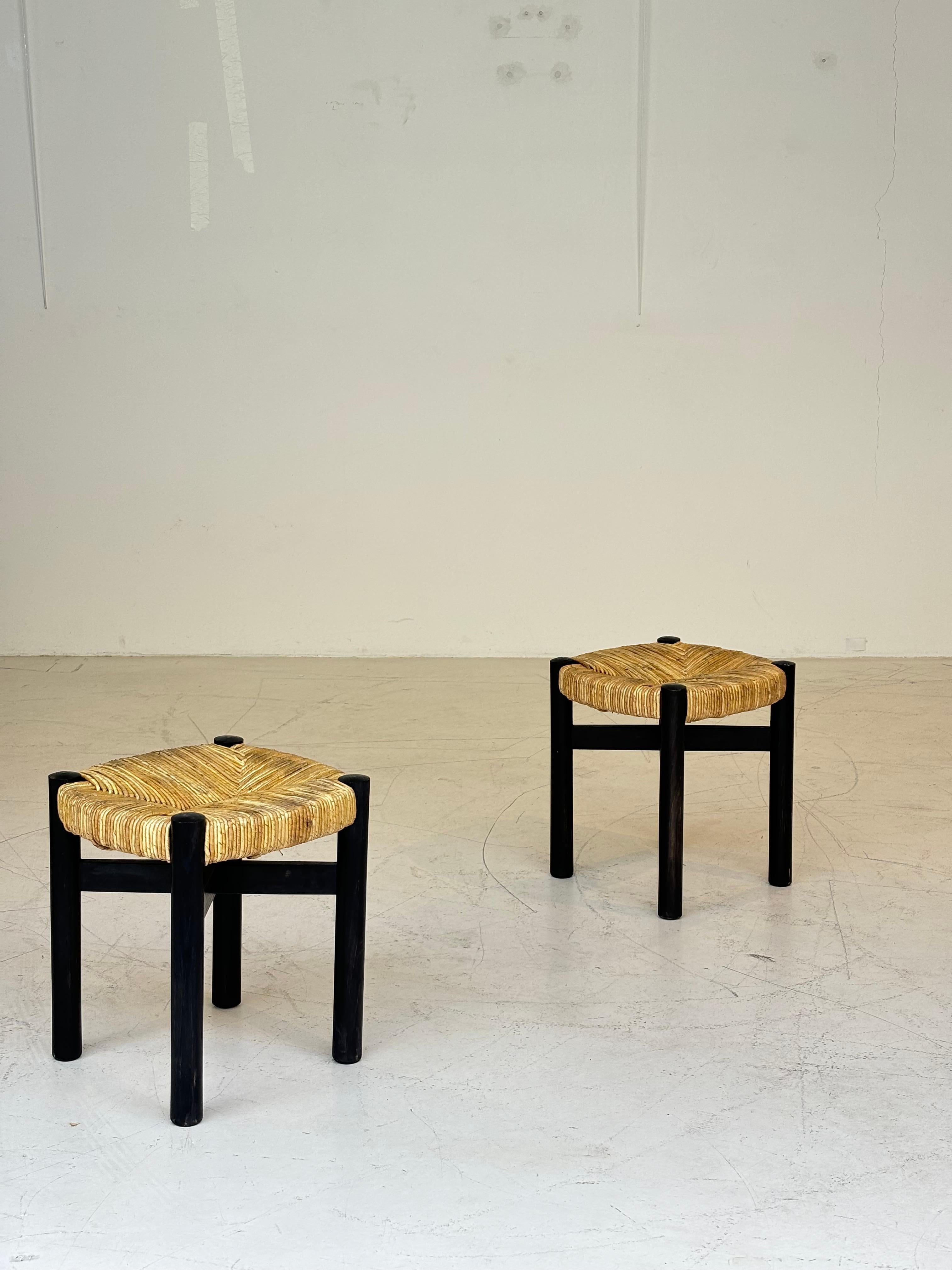 Nice pair of Meribel stools by Charlotte Perriand, original black colors