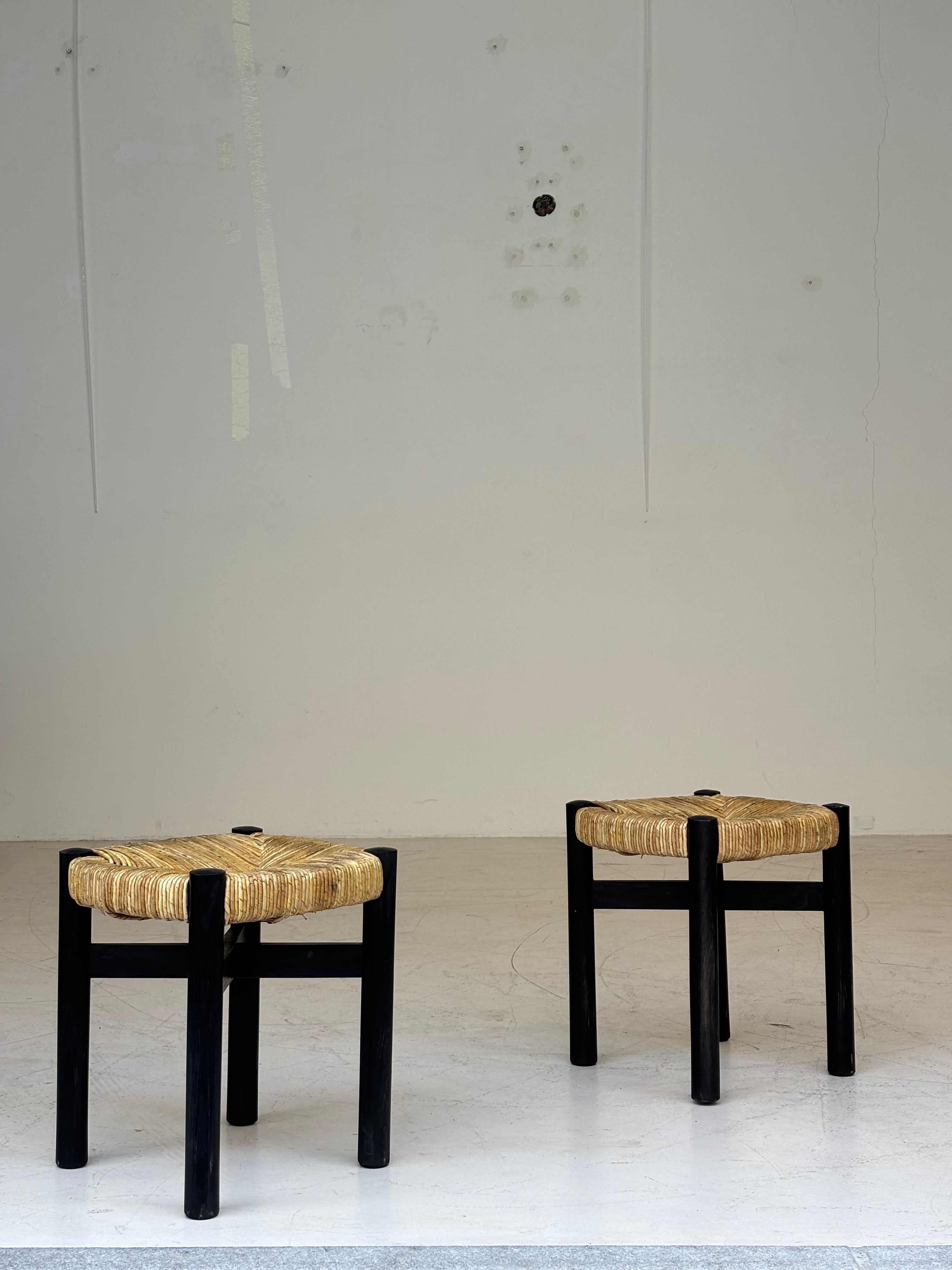 Nice pair of Meribel stools by Charlotte Perriand, original black colors