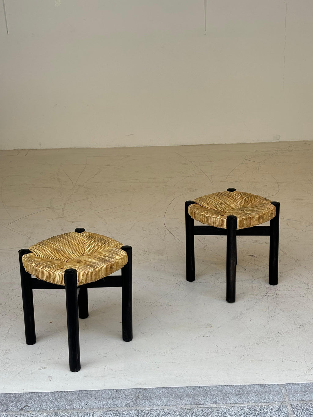 Nice pair of Meribel stools by Charlotte Perriand, original black colors