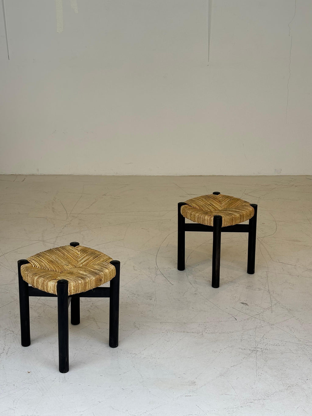 Nice pair of Meribel stools by Charlotte Perriand, original black colors