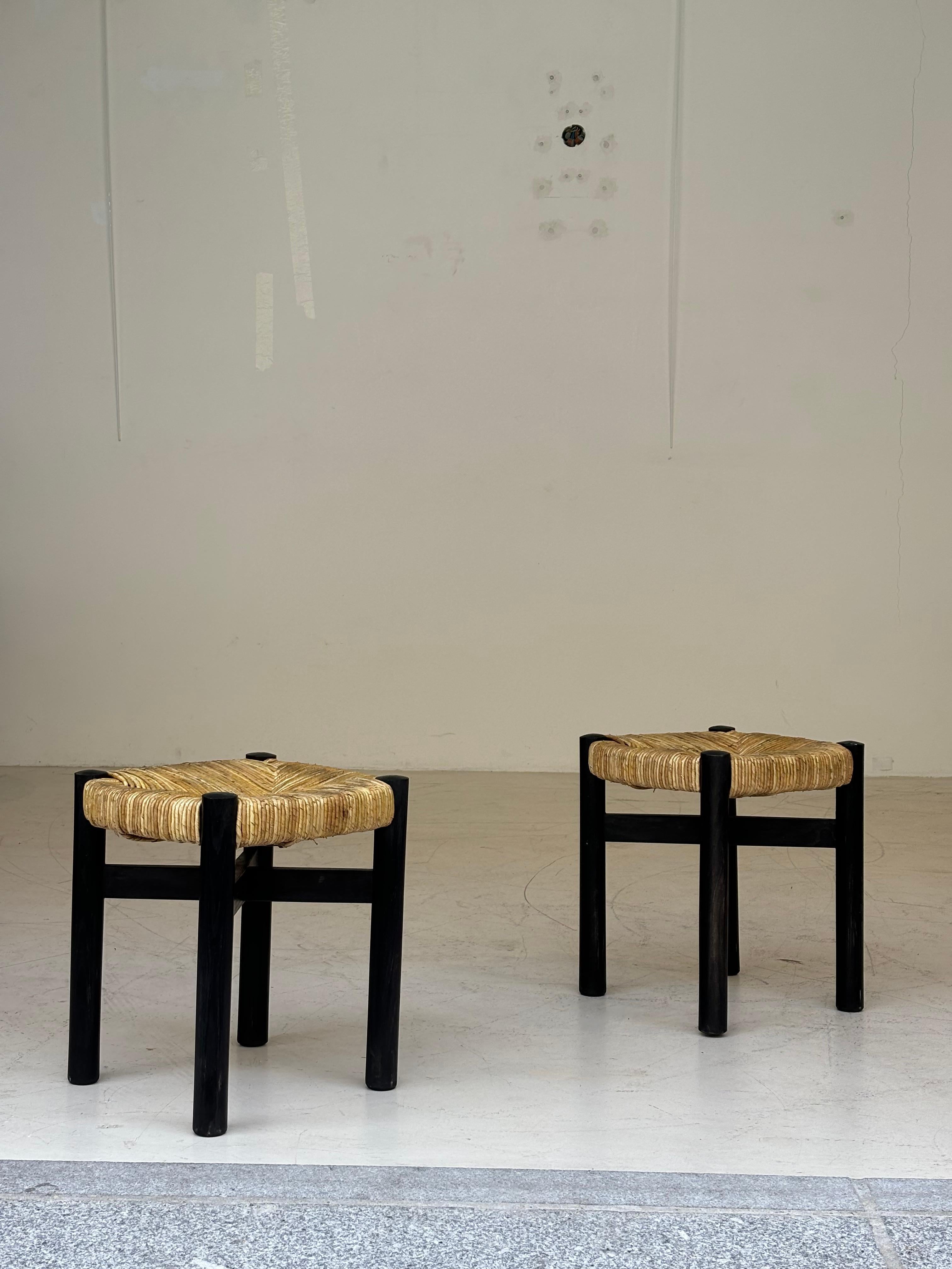 Nice pair of Meribel stools by Charlotte Perriand, original black colors