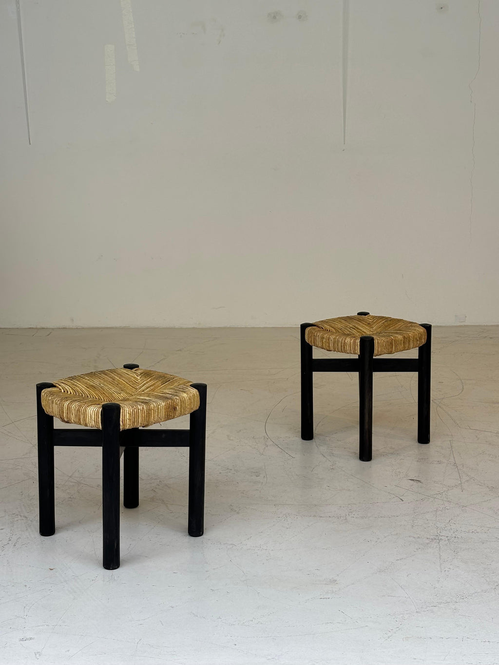 Nice pair of Meribel stools by Charlotte Perriand, original black colors
