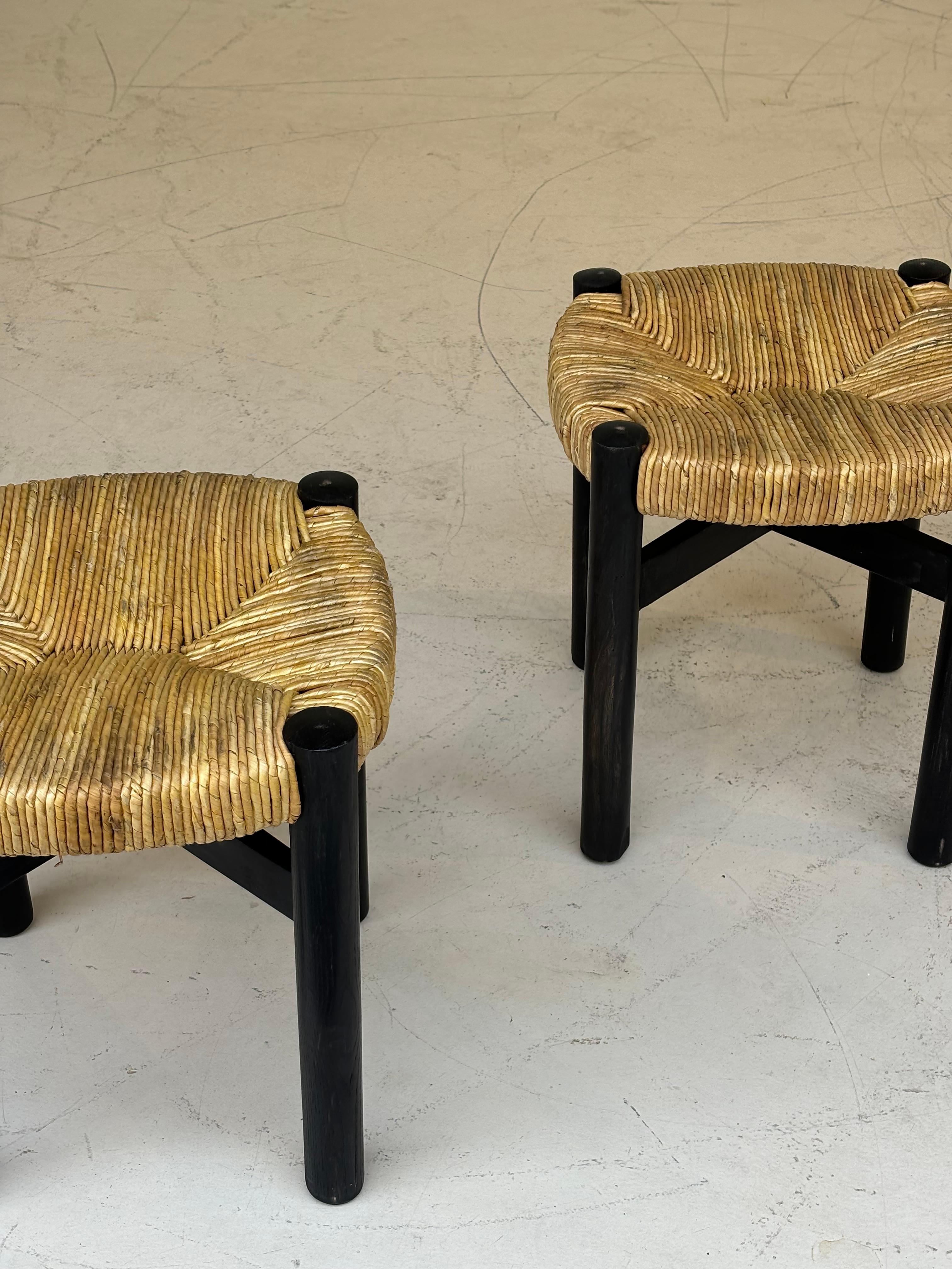Nice pair of Meribel stools by Charlotte Perriand, original black colors