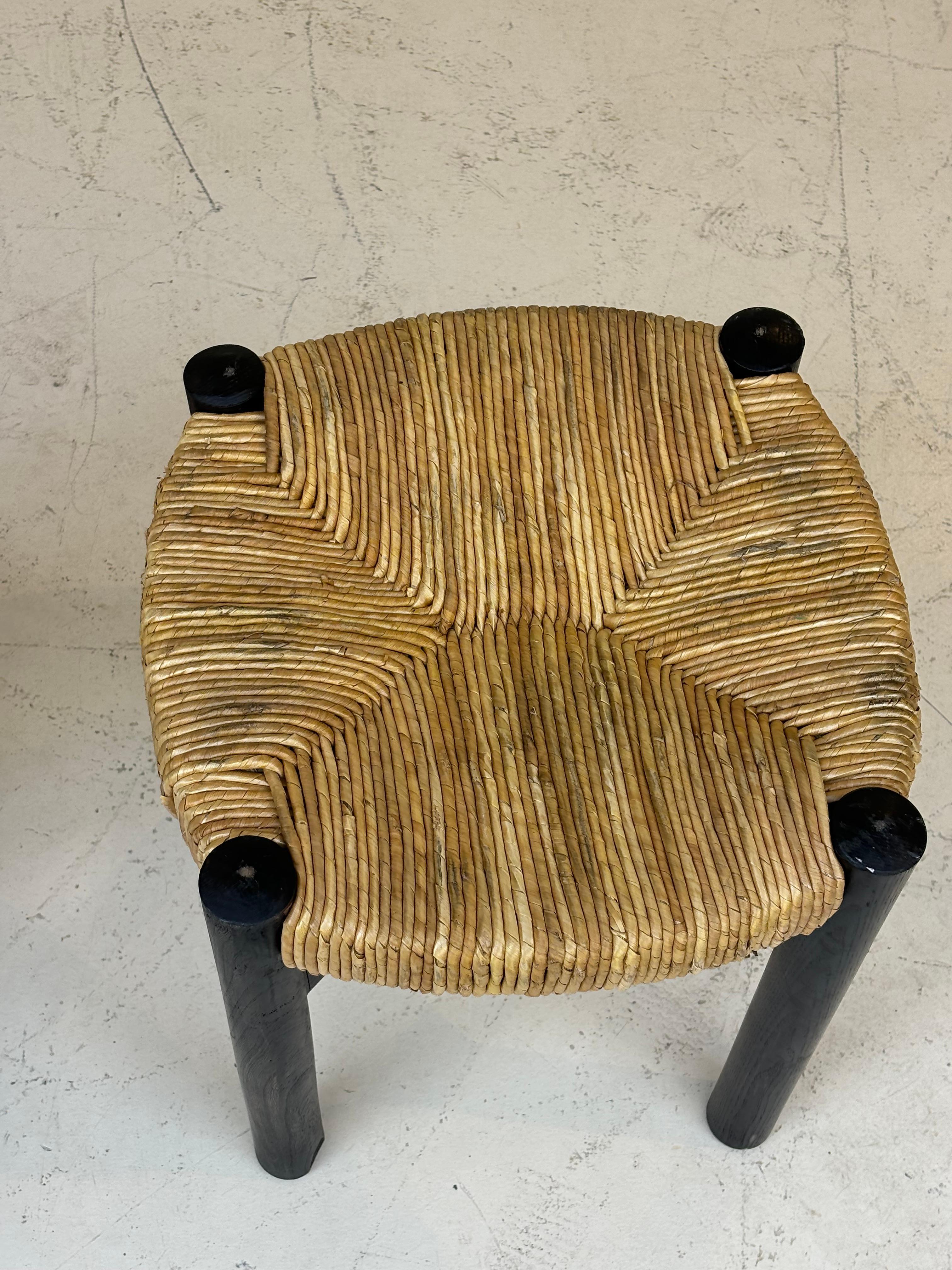 Nice pair of Meribel stools by Charlotte Perriand, original black colors