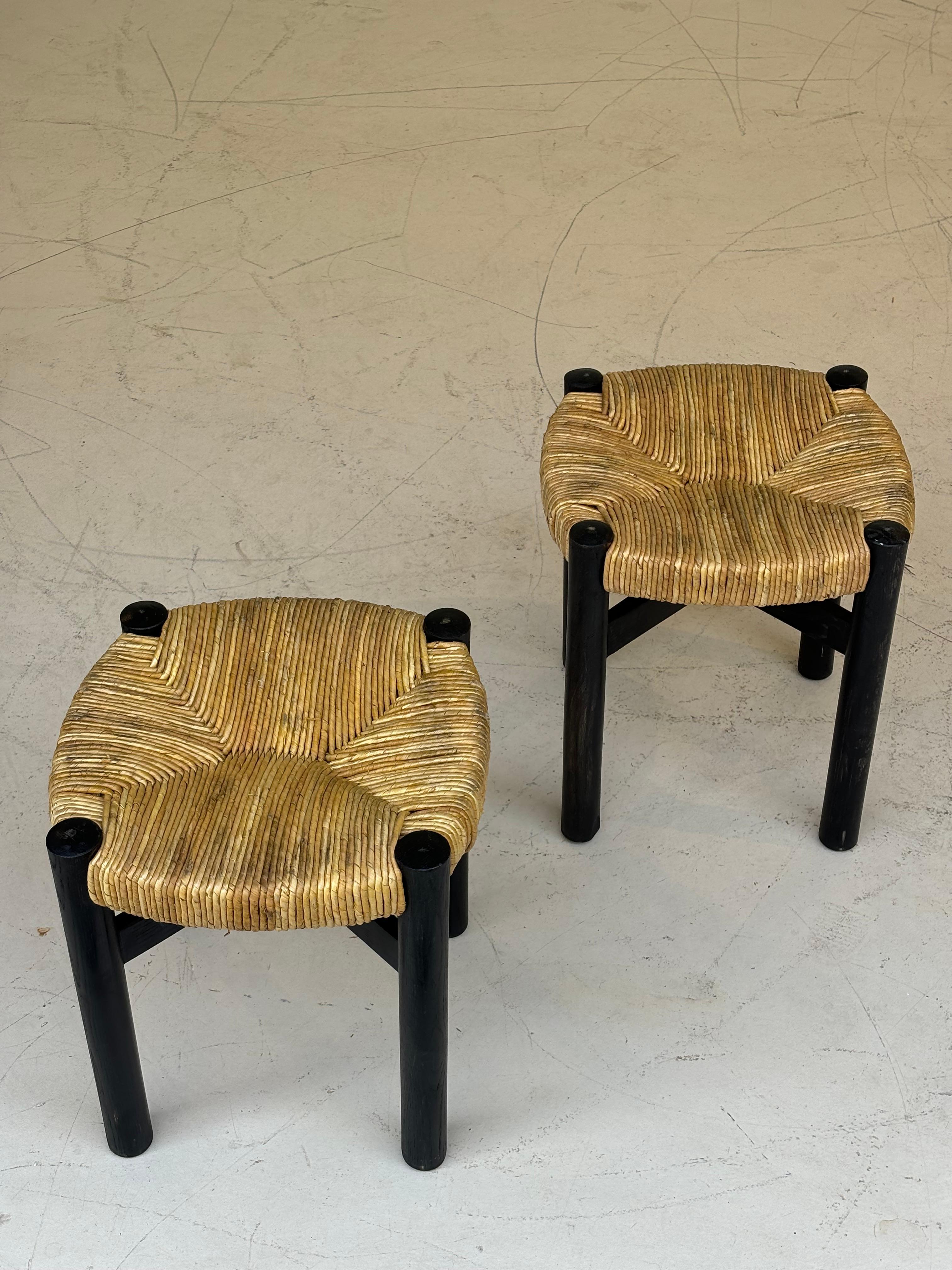 Nice pair of Meribel stools by Charlotte Perriand, original black colors