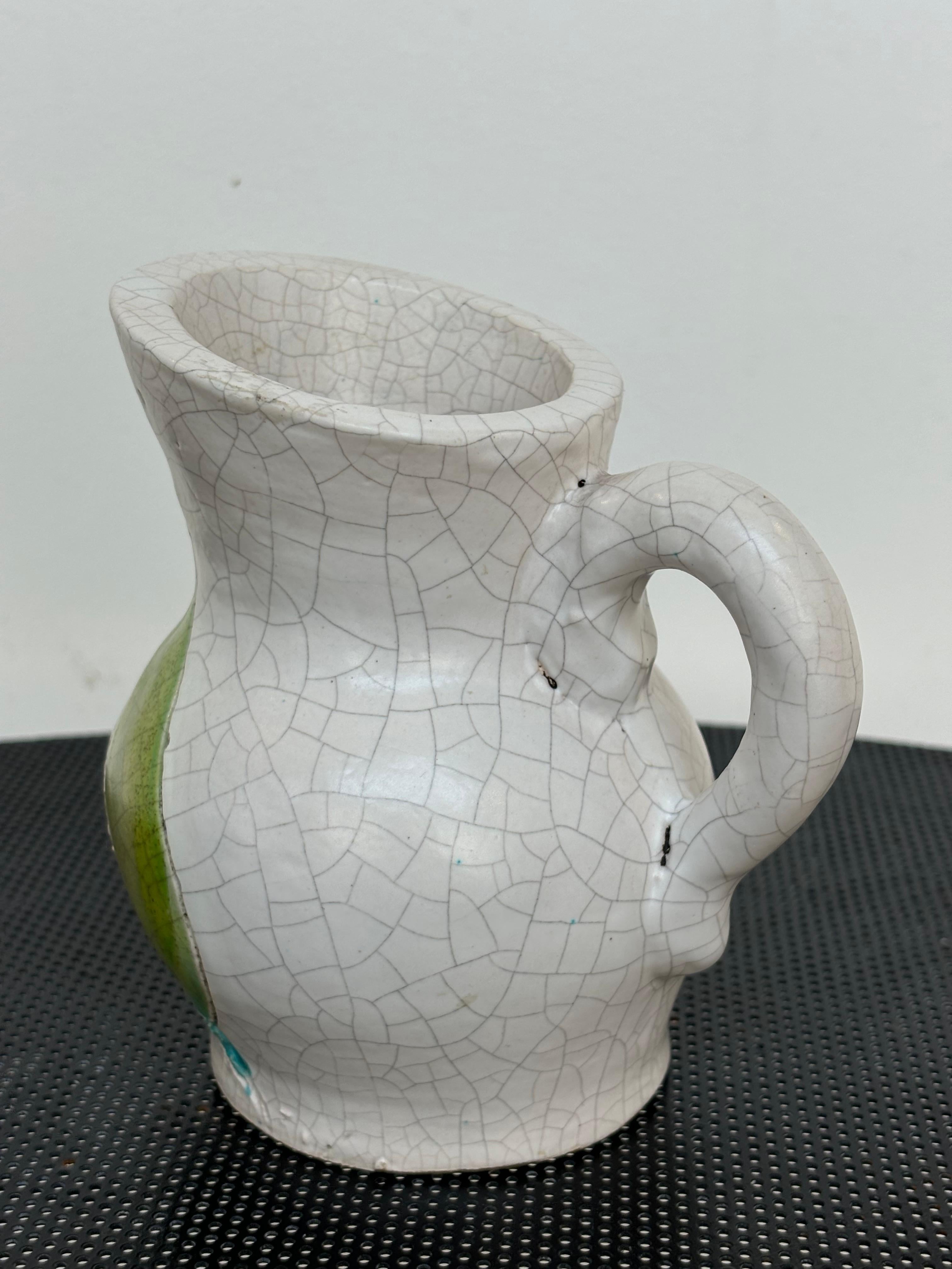 Beautiful figurative pitcher by Georges Jouve, signed