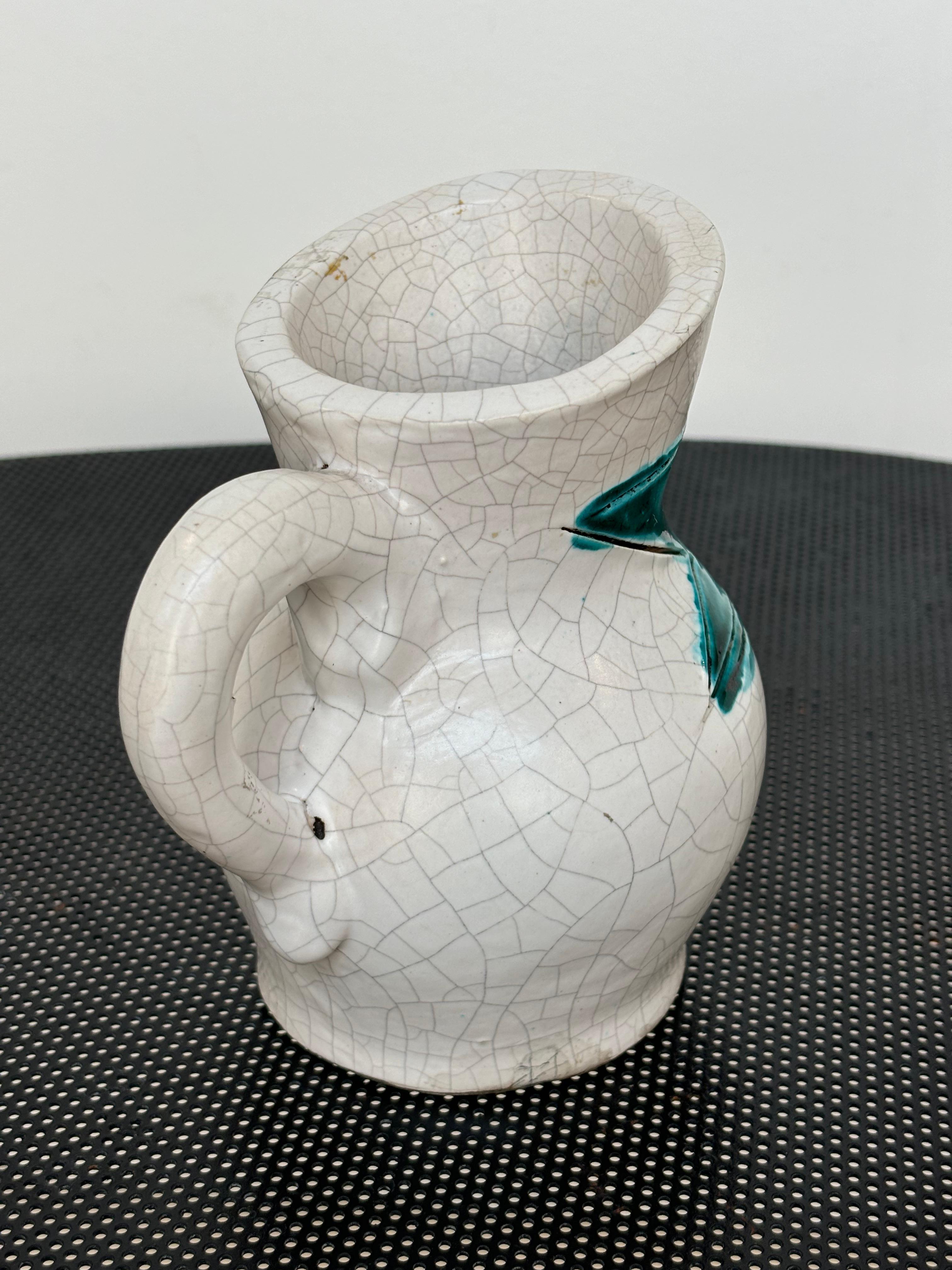 Beautiful figurative pitcher by Georges Jouve, signed