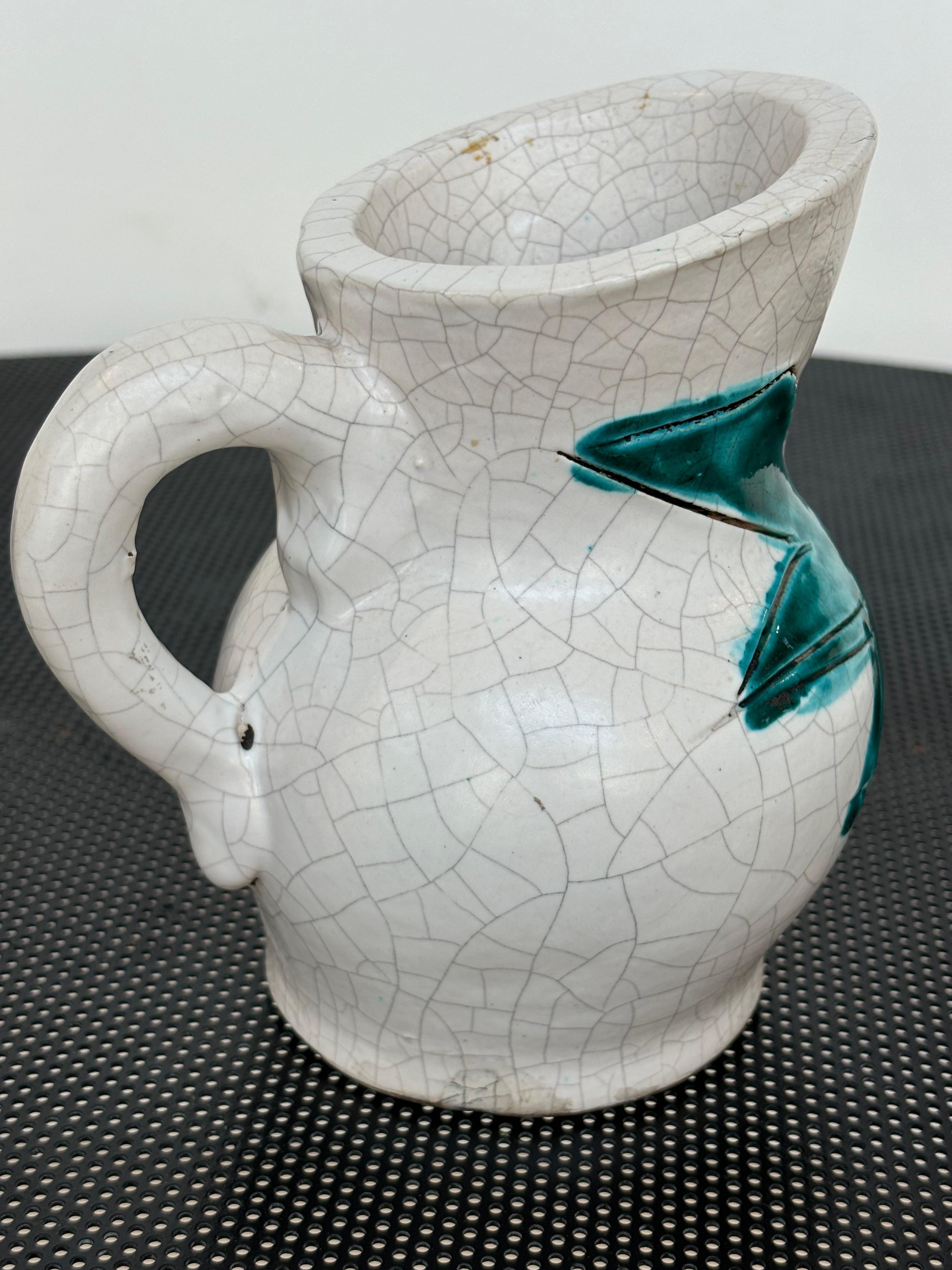 Beautiful figurative pitcher by Georges Jouve, signed