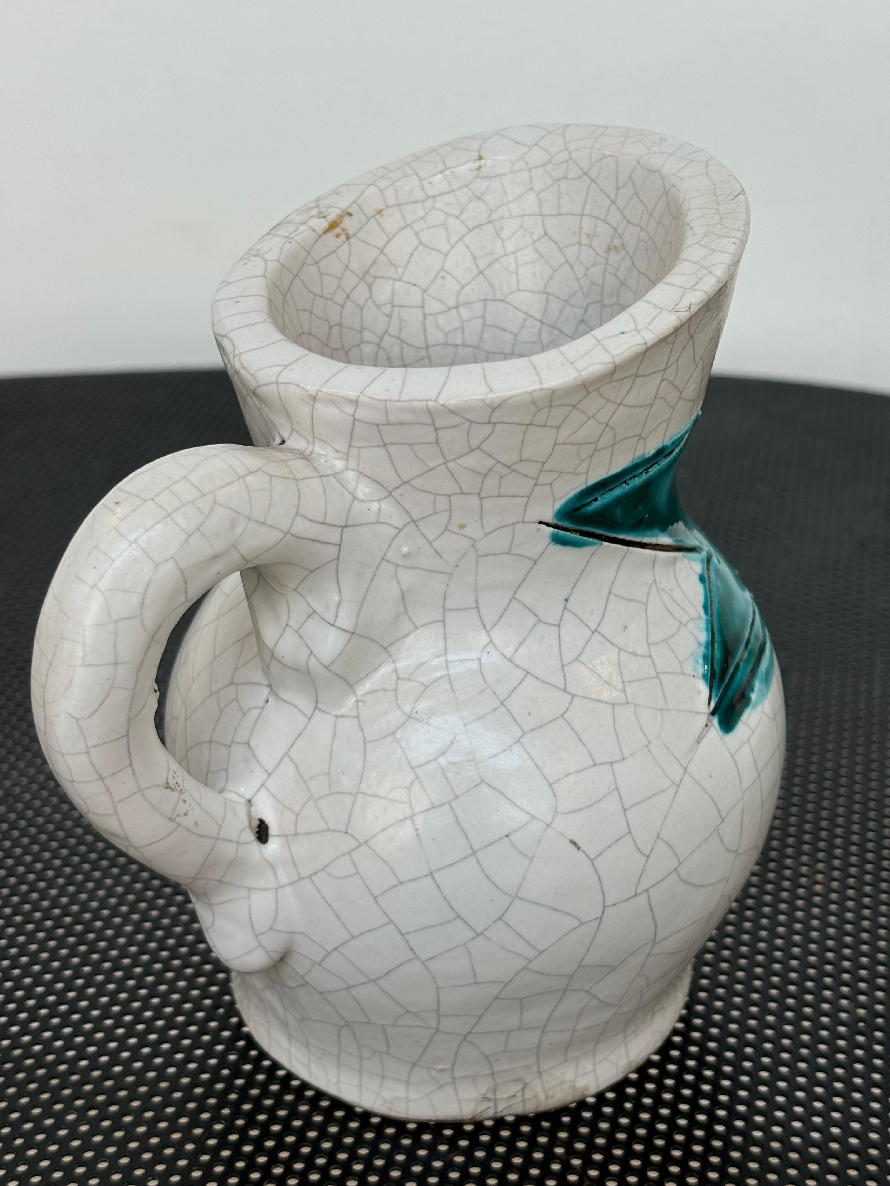 Beautiful figurative pitcher by Georges Jouve, signed