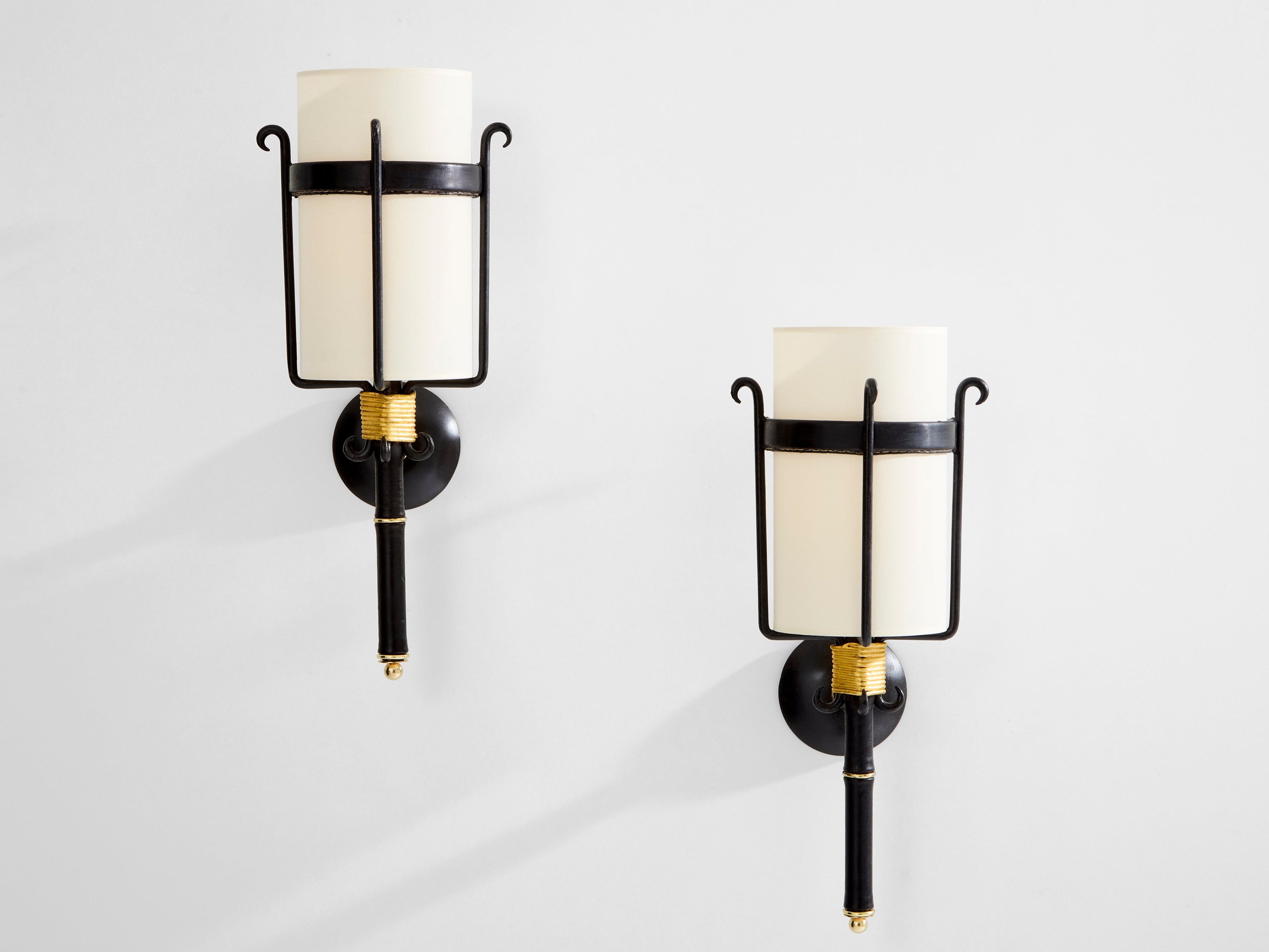 Jacques Adnet wrought iron leather and brass wall lights 1950