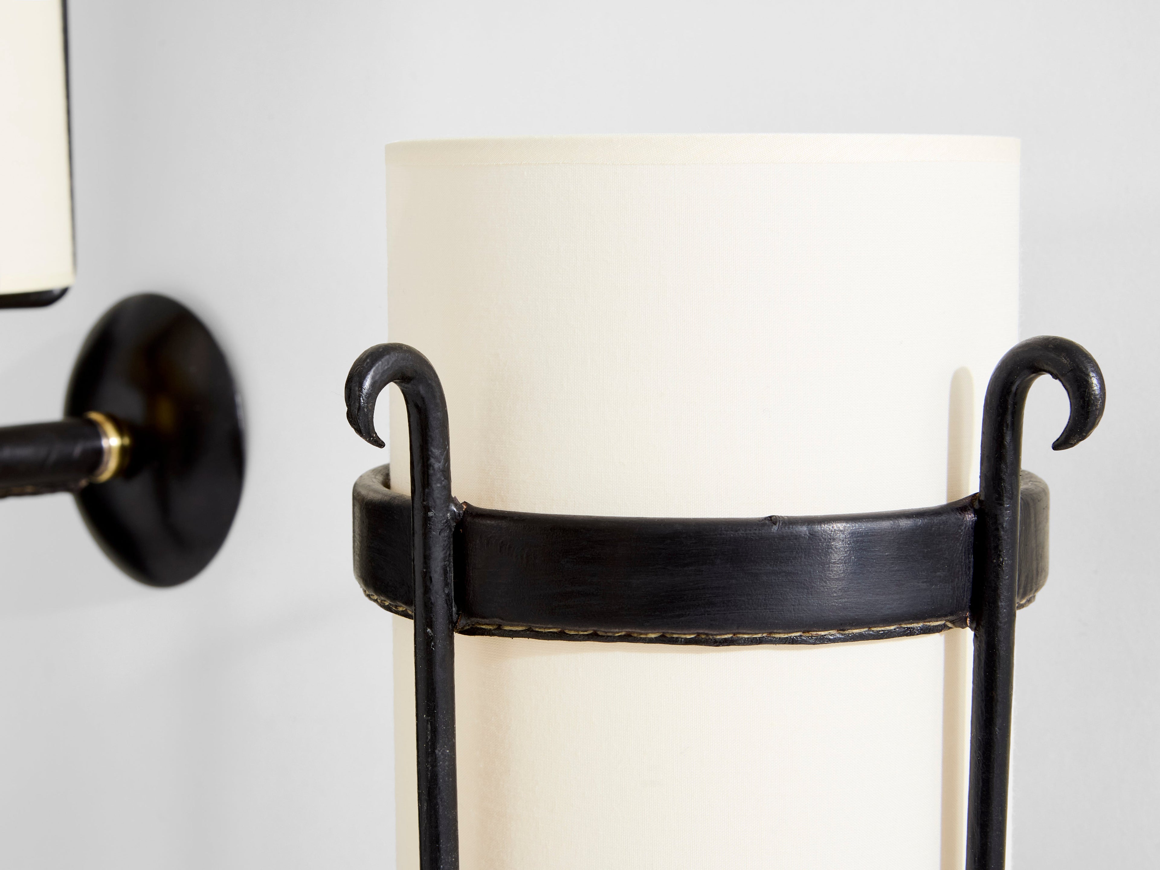 Jacques Adnet wrought iron leather and brass wall lights 1950