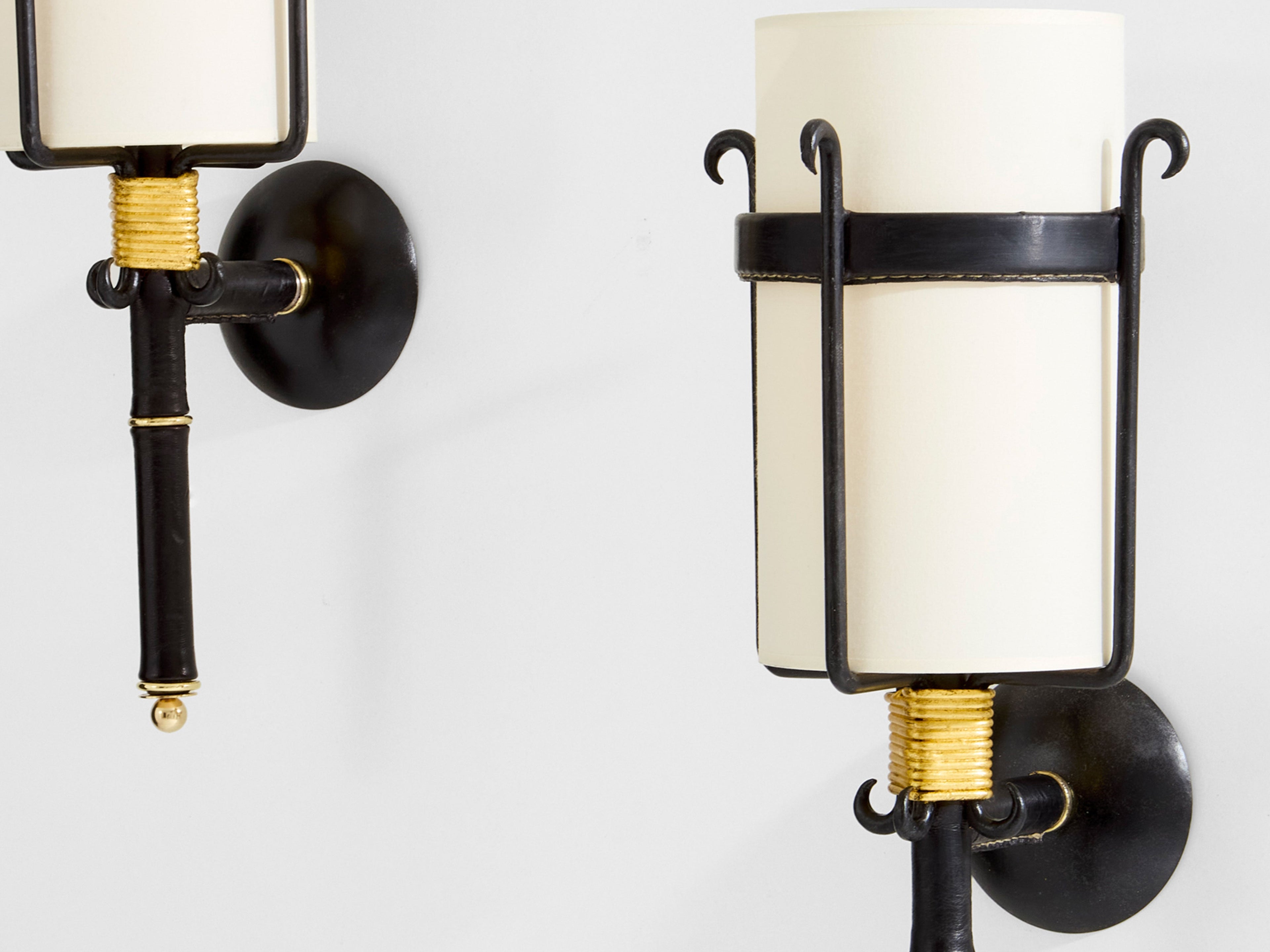 Jacques Adnet wrought iron leather and brass wall lights 1950