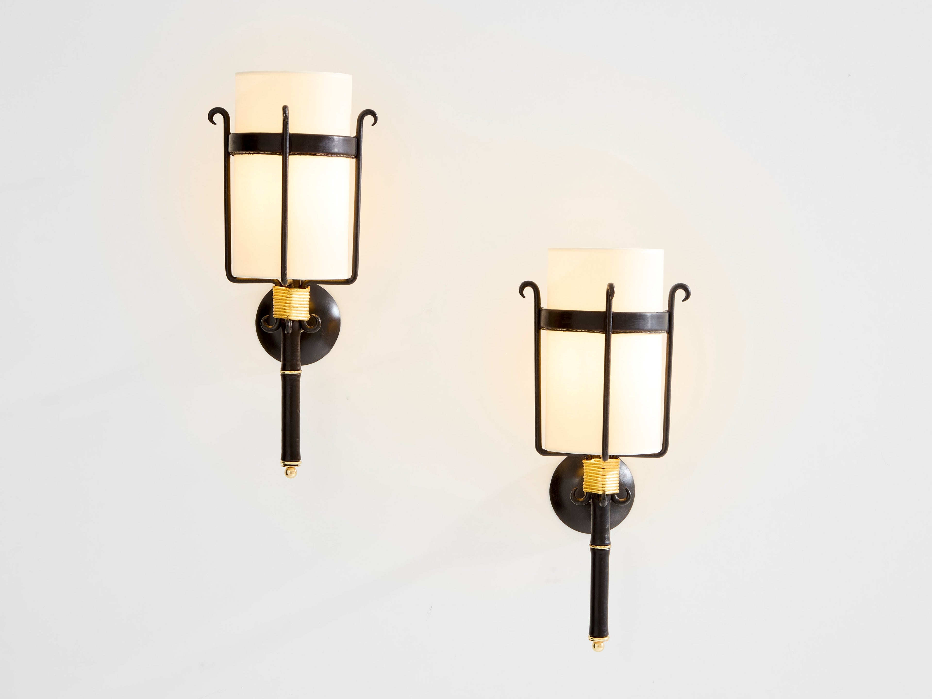 Jacques Adnet wrought iron leather and brass wall lights 1950