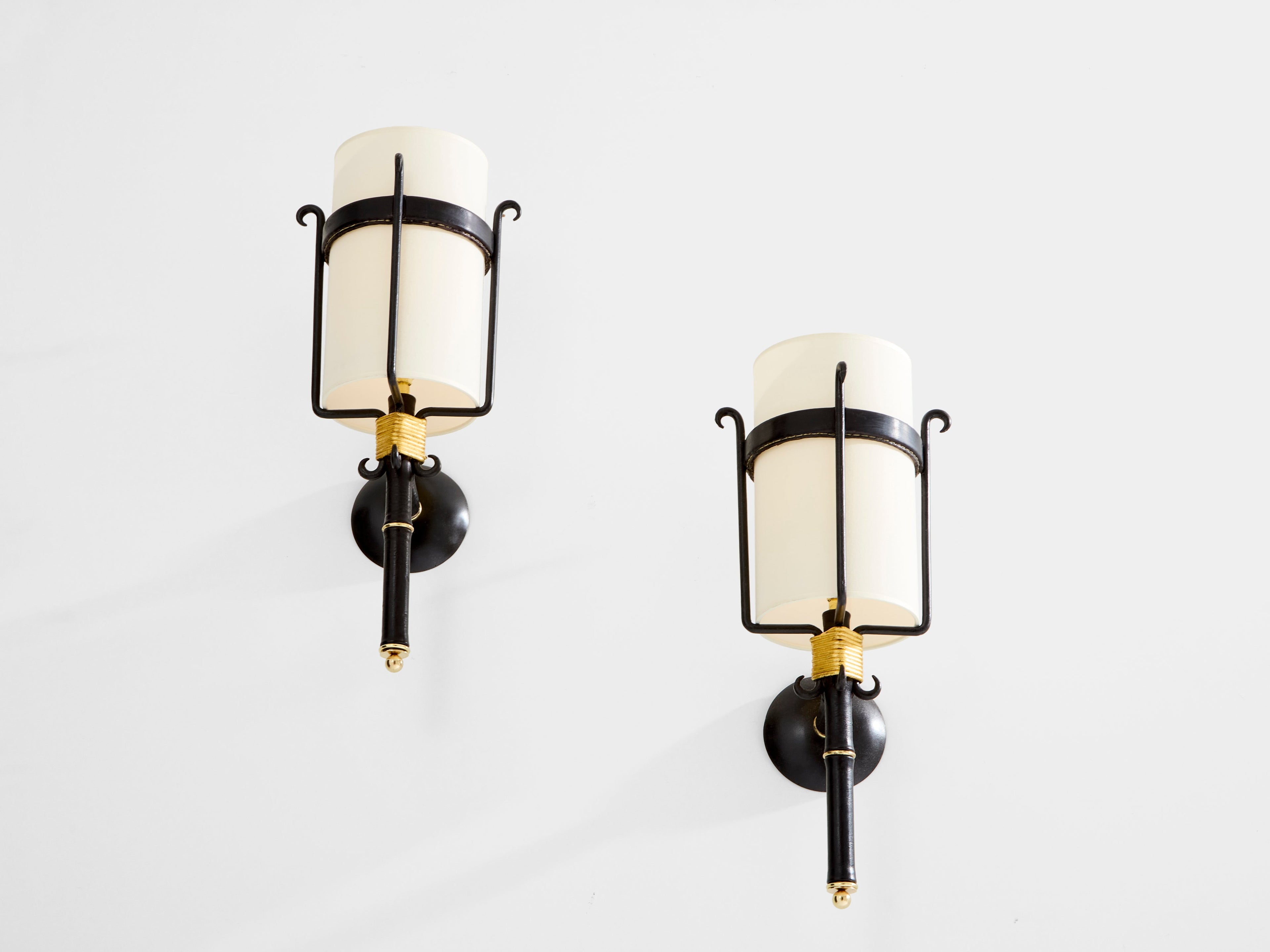 Jacques Adnet wrought iron leather and brass wall lights 1950