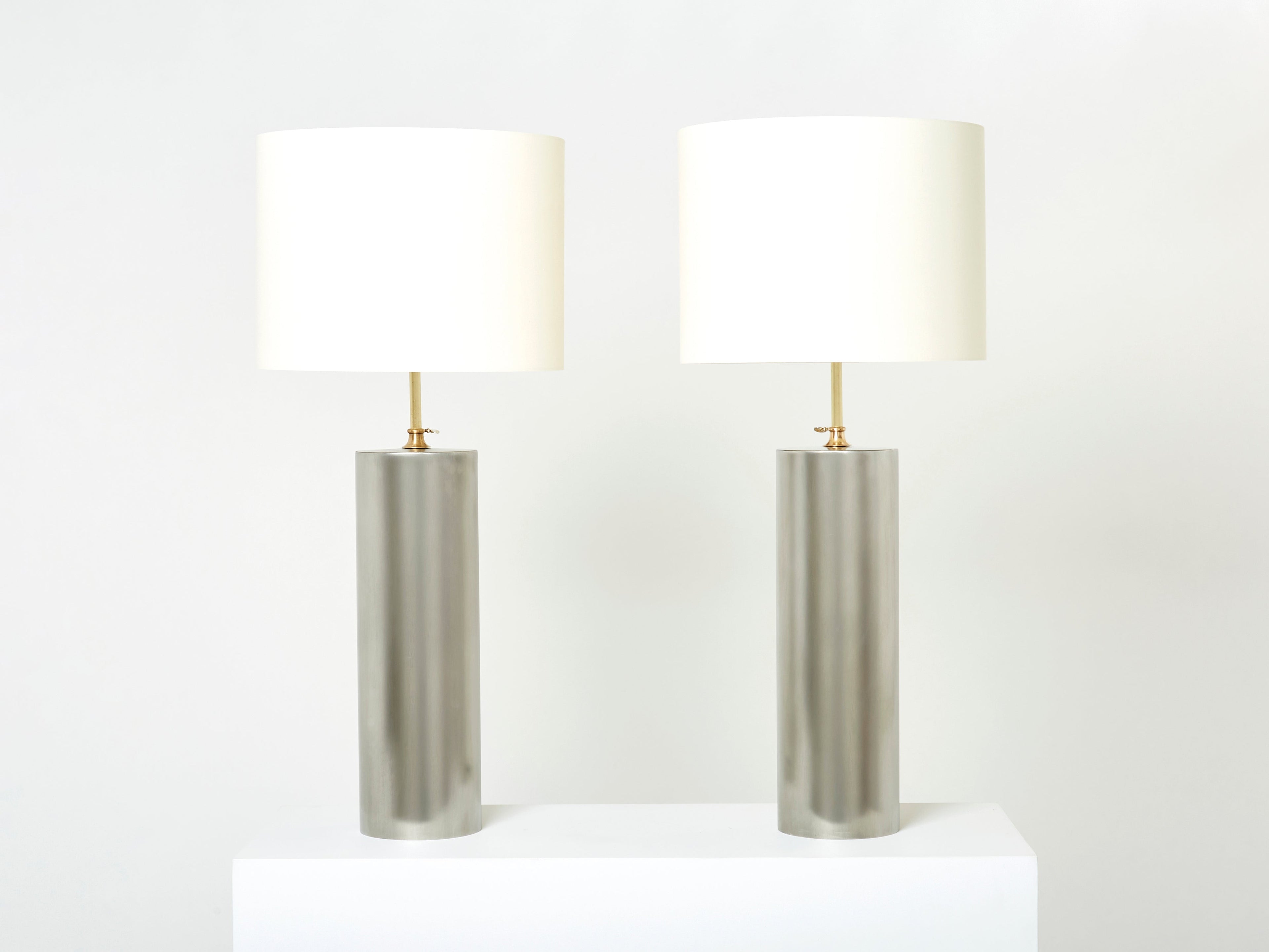 Pair of modernist brushed steel lamps 1966