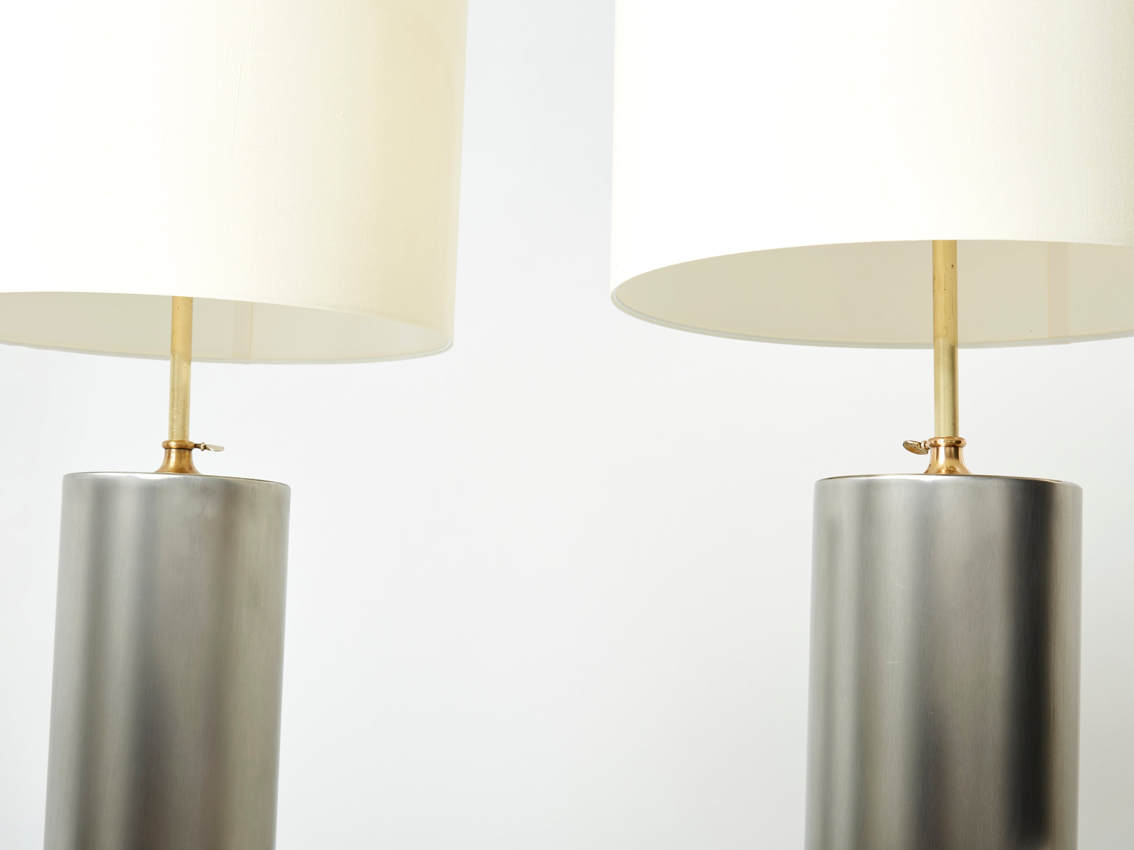 Pair of modernist brushed steel lamps 1966